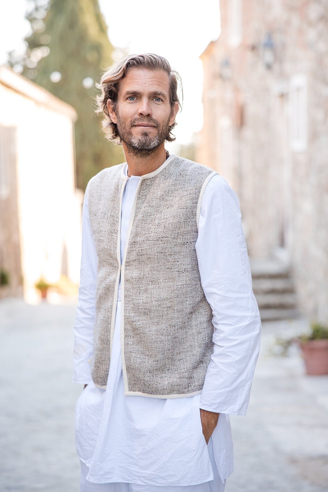 Constantin Bjerke standing outside wearing a white outfit