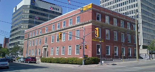 Parking is available behind the building at 10 Duke Street West in Kitchener