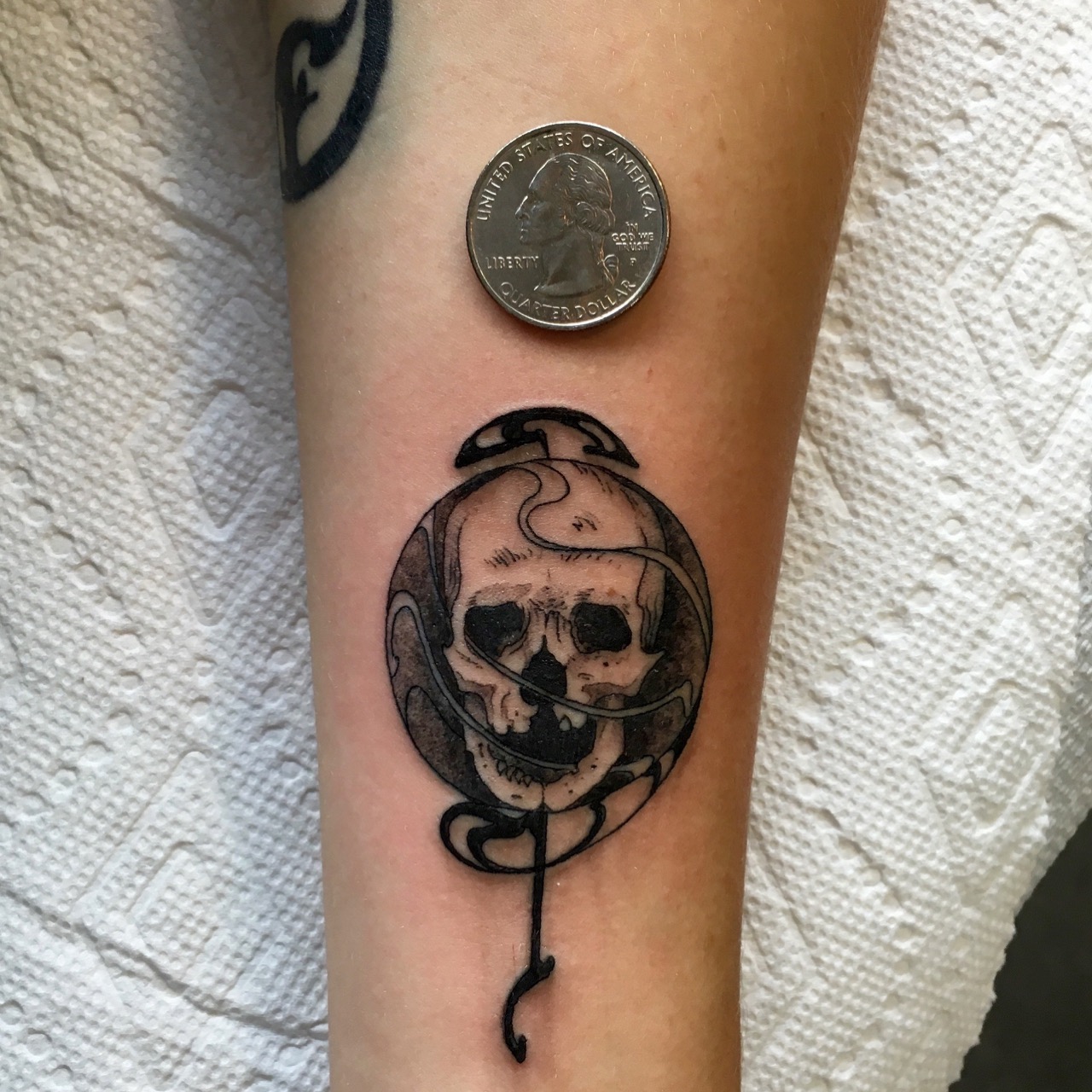 A tiny canvas means no room for mistakes. Alphabet City tattoo artist Gerald Feliciano specializes in designs the size of a quarter.