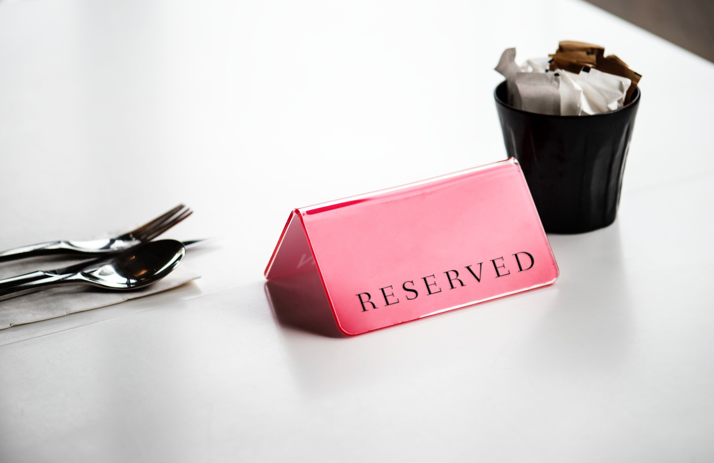 Red RESERVED Sign on Table - place setting.jpg