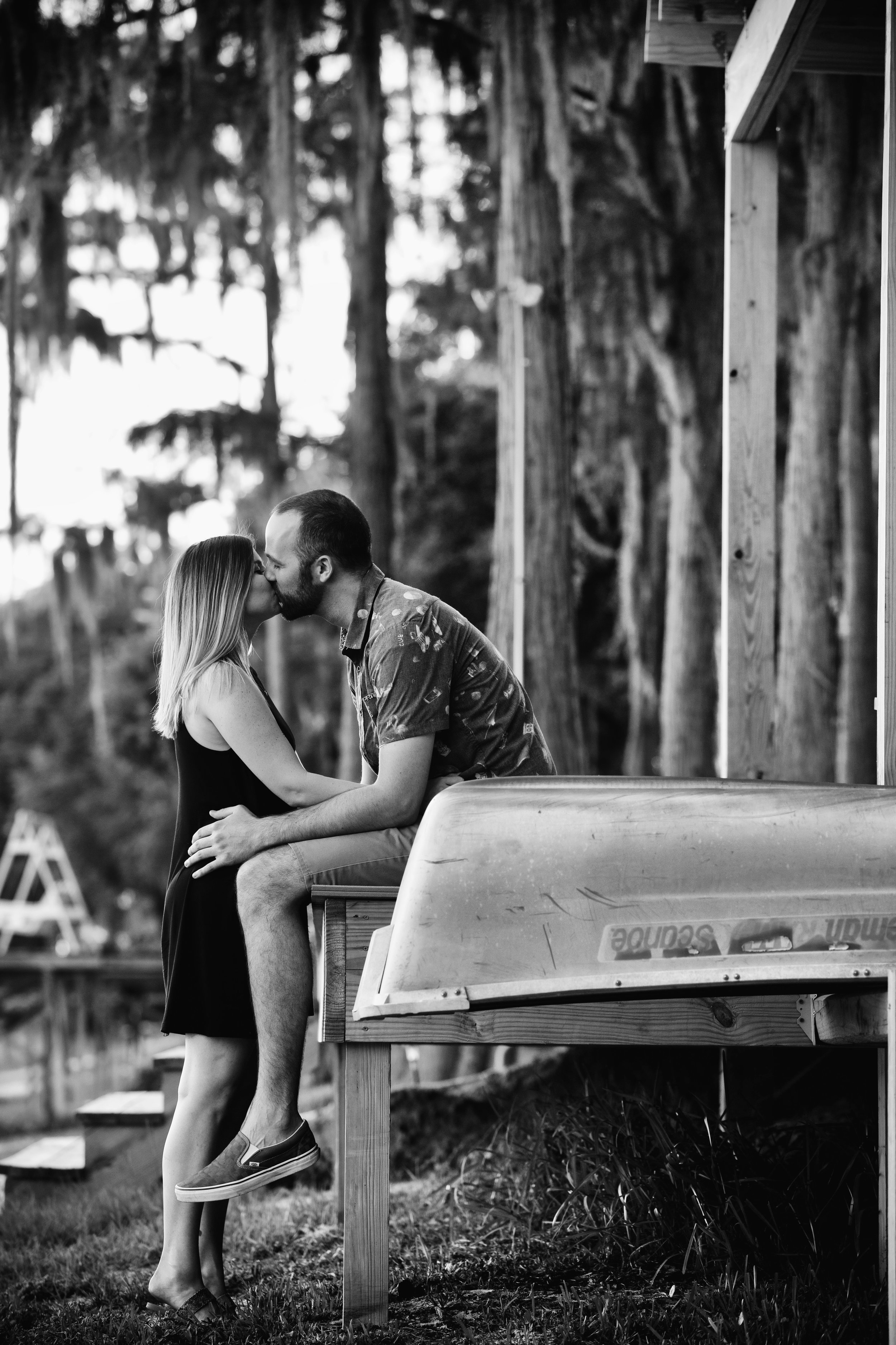 Gainesville Outdoor Summer Engagement Photography by the Lake with Canoe