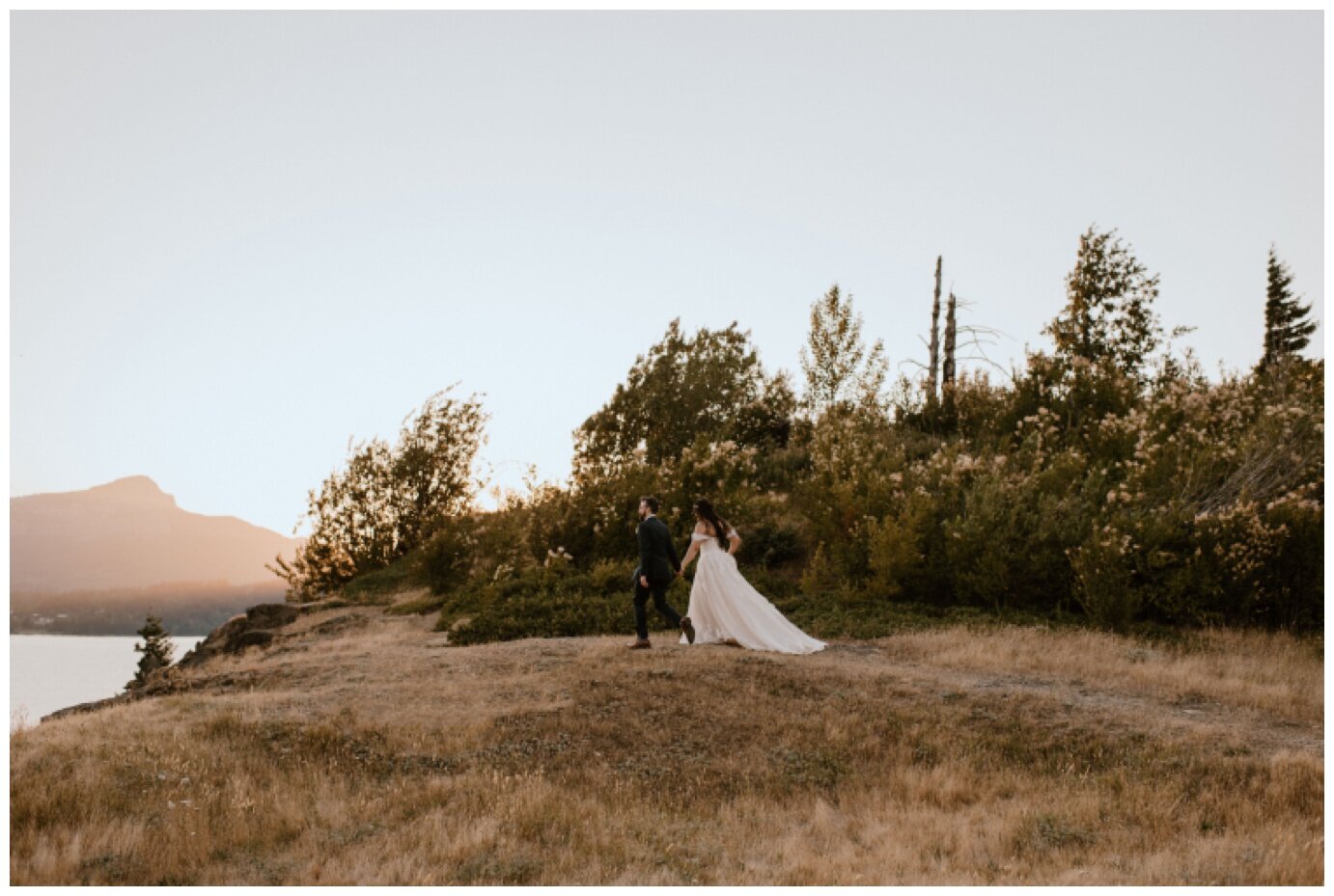 bride and groom taking sunset portraits during columbia river gorge elopement