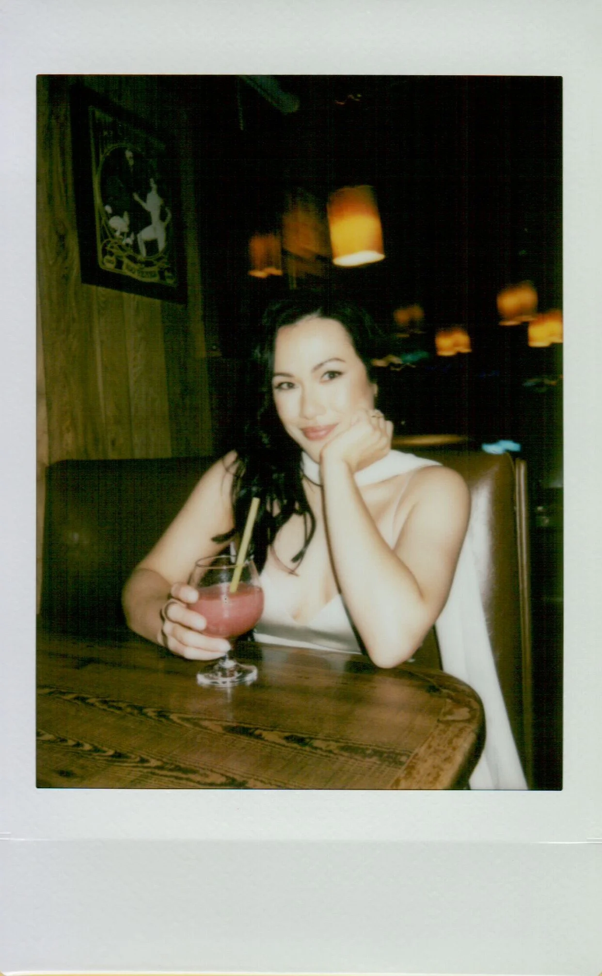  Polaroid photo of Rachel and Dakota during their Portland engagement session, candid and nostalgic moment, shot on Polaroid 