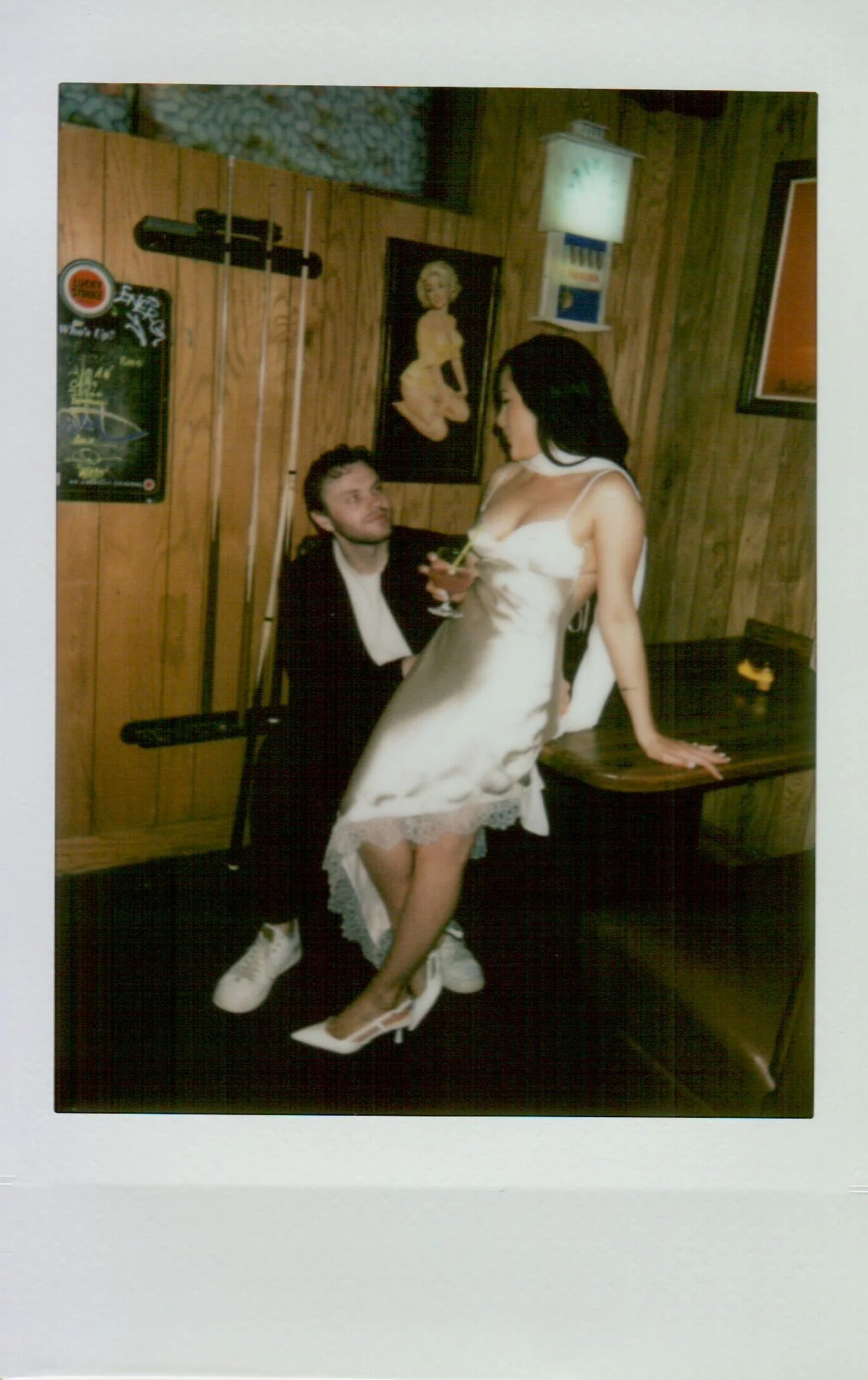  Polaroid photo of Rachel and Dakota during their Portland engagement session, candid and nostalgic moment, shot on Polaroid 