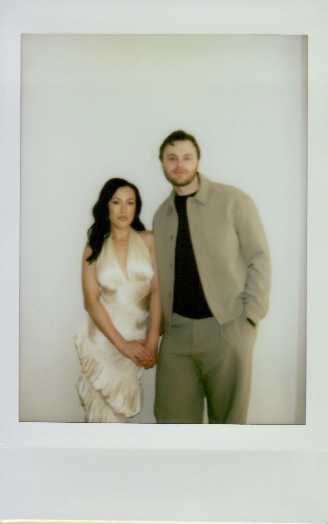 Polaroid photo of Rachel and Dakota during their Portland engagement session, candid and nostalgic moment, shot on Polaroid 