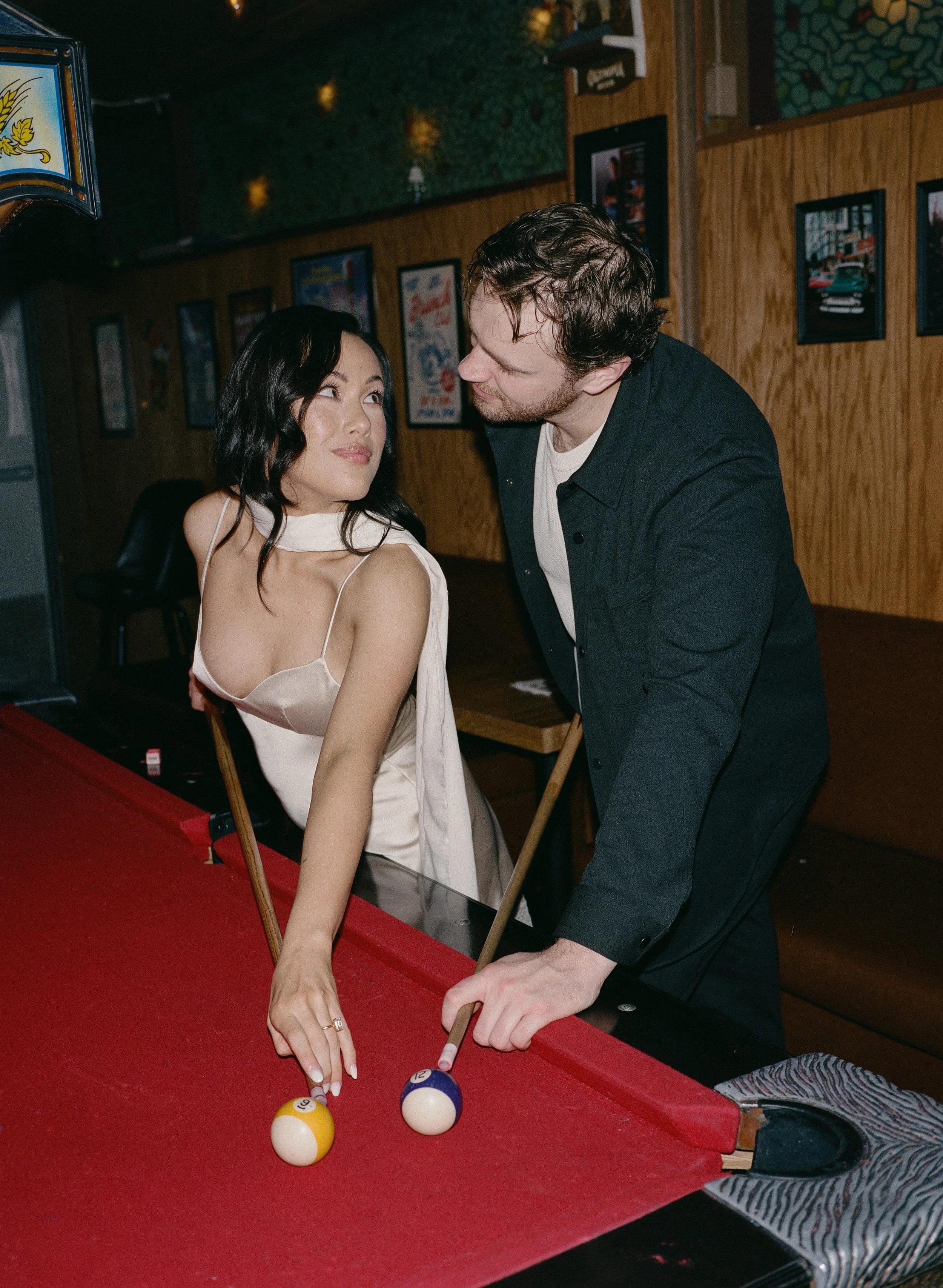  Rachel and Dakota posing together at The Sandy Hut with bold direct flash, playful Portland engagement session 
