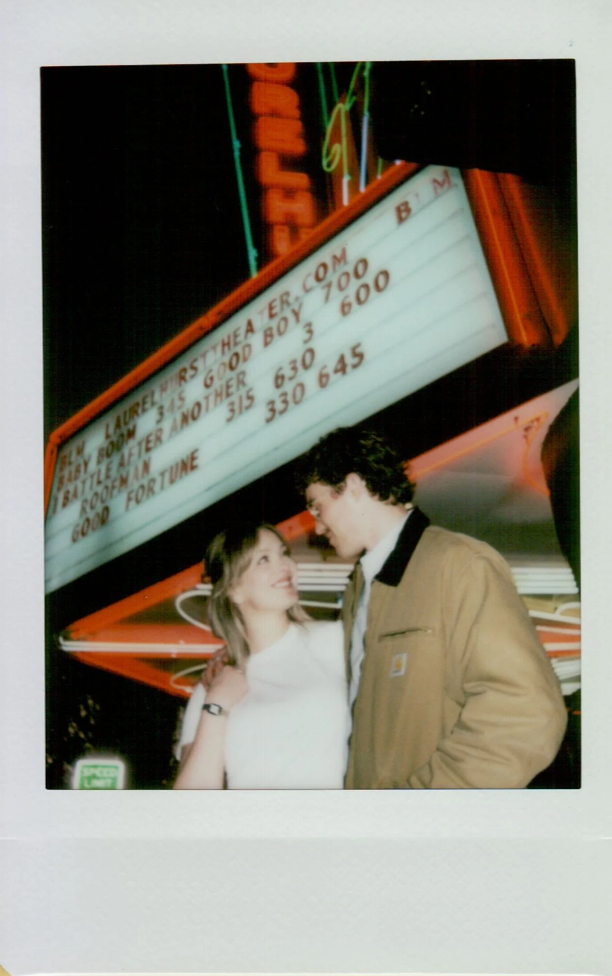  polaroid of couple during engagement session in Portland Oregon, soft tones and instant film texture 