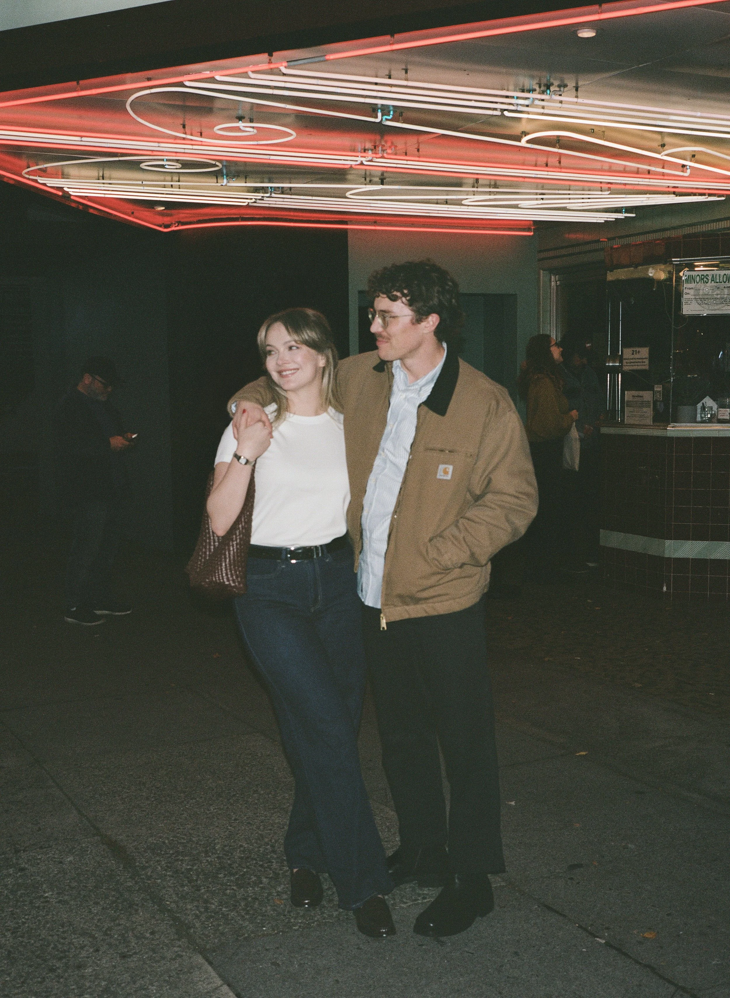  cinematic night portraits with bold neon signage and shadows, Portland engagement photographer, 120mm late night flash photos 