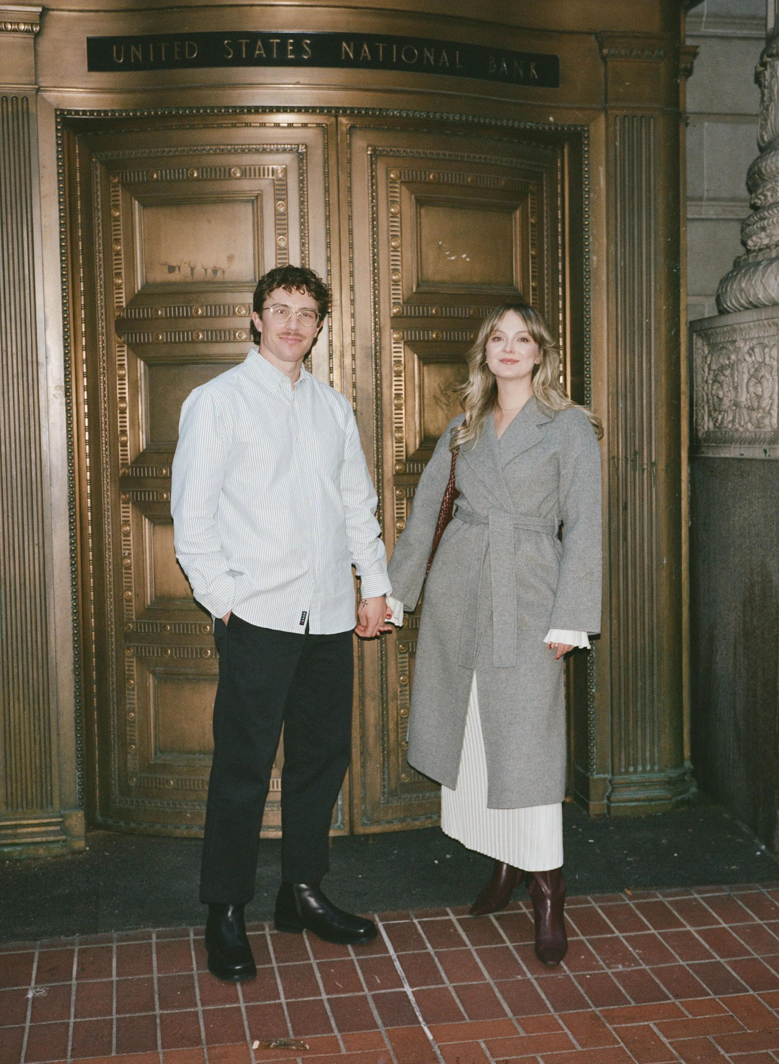  film-inspired engagement photos in downtown Portland with clean lines and soft light, natural movement and editorial feel 