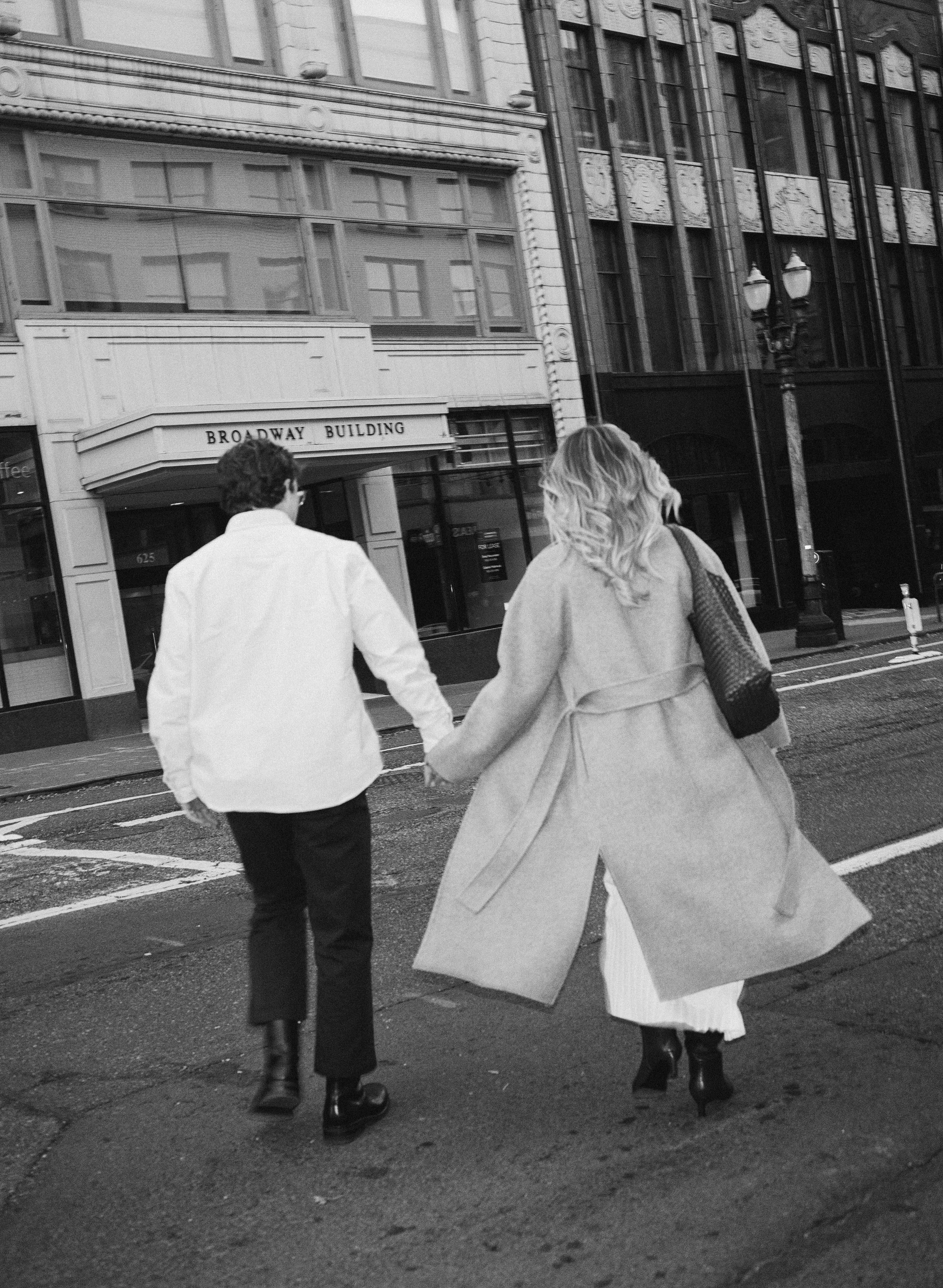  film-inspired engagement photos in downtown Portland with clean lines and soft light, natural movement and editorial feel 