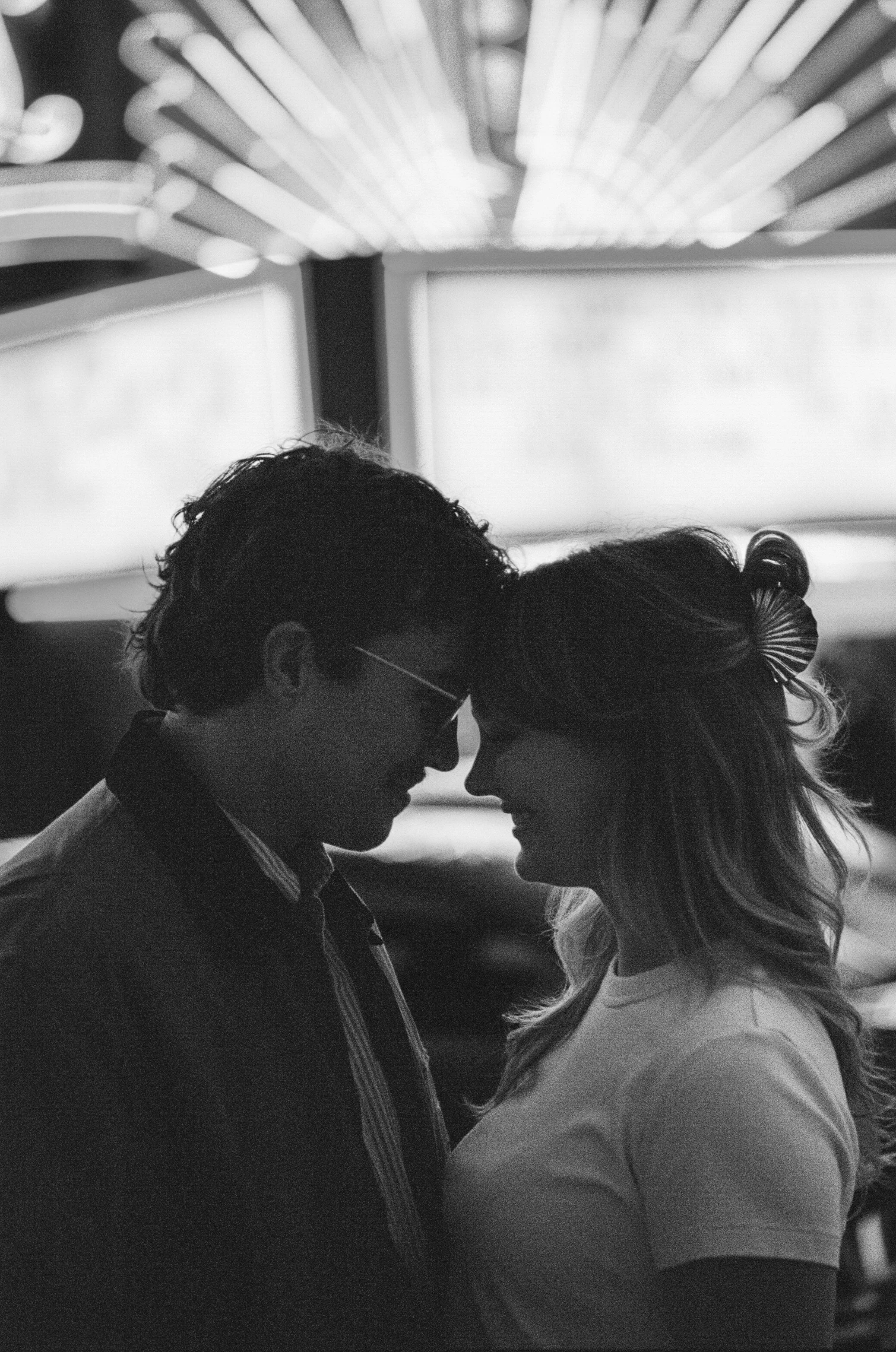  cinematic night portraits with bold neon signage and shadows, Portland engagement photographer, 35mm film 