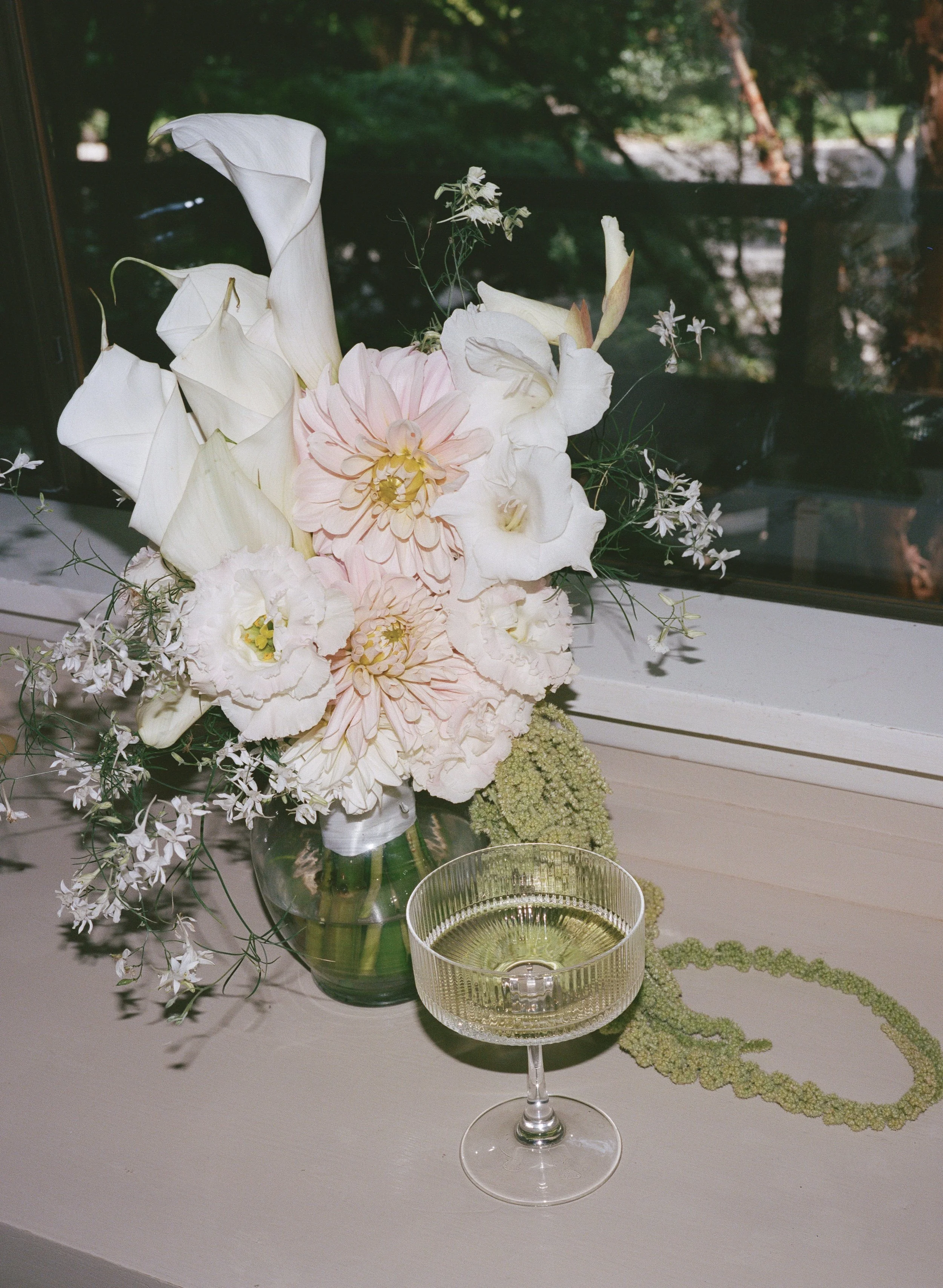  Luxury garden wedding at JM Cellars with organic greenery, romantic details, and editorial and film wedding photography 