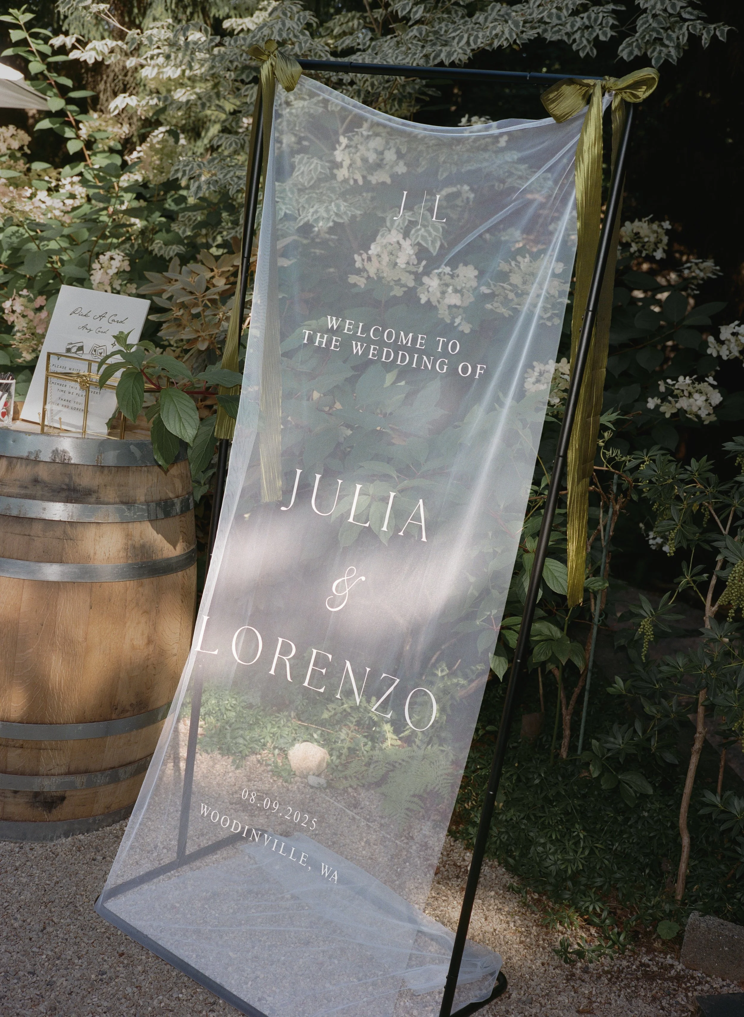  Editorial wedding portrait at JM Cellars showcasing the venue’s unique urban winery atmosphere and natural surroundings. Tulle veil wedding welcome sign 