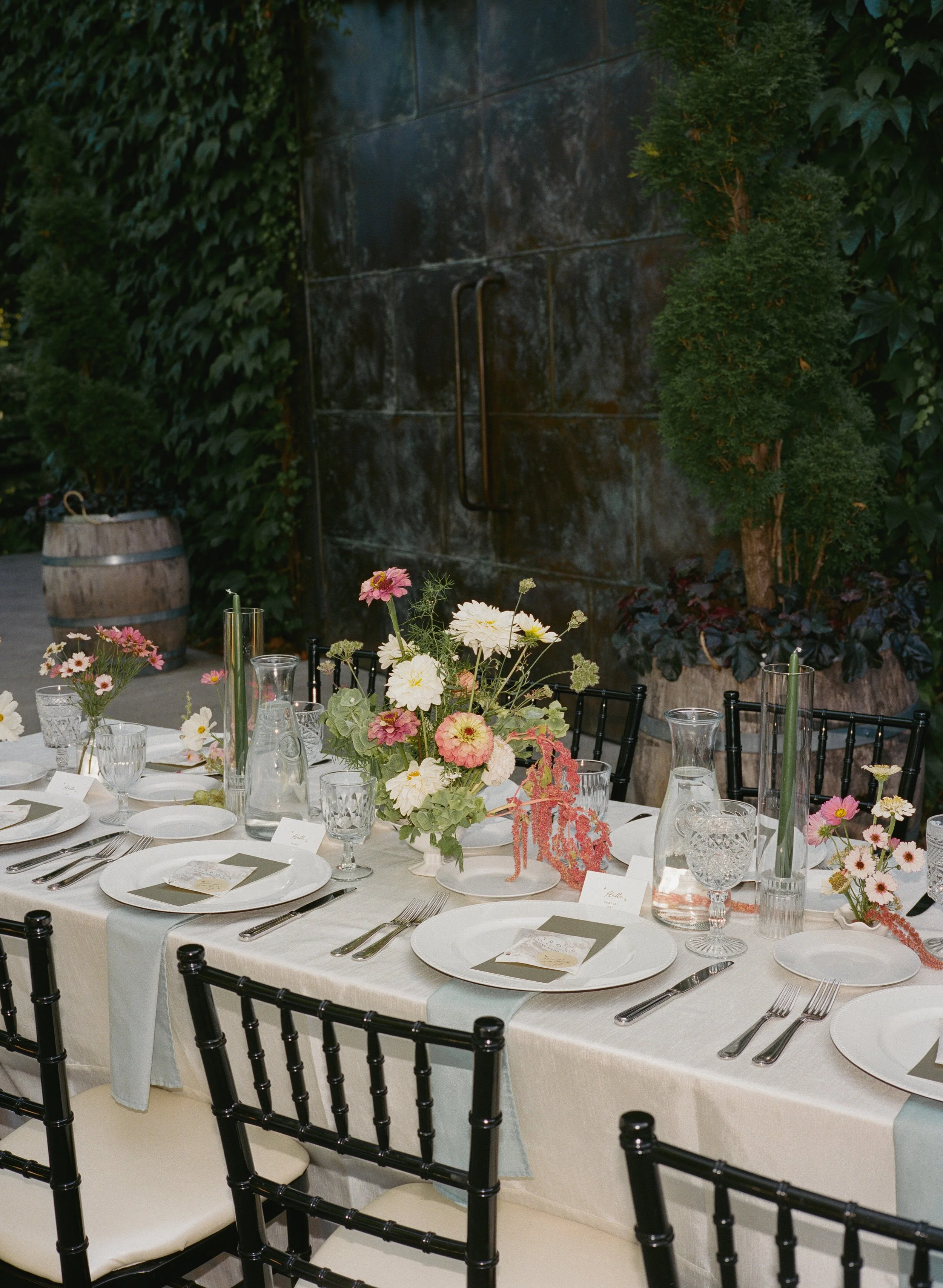 Luxury garden wedding at JM Cellars with long dinner tables, organic greenery, romantic details, and editorial and film wedding photography 