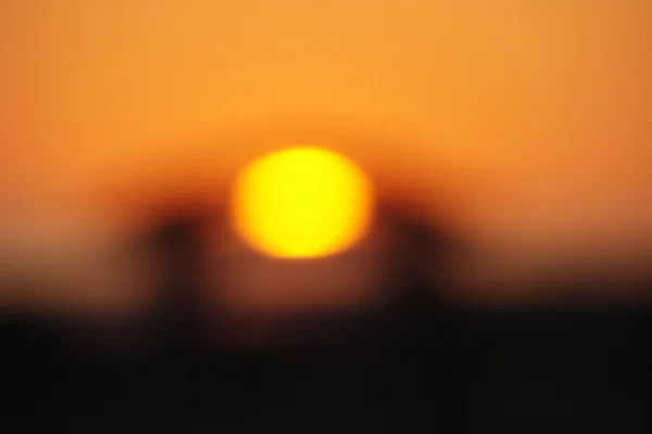 altered_sunsets-sun_melting_into_palapa_2.jpg