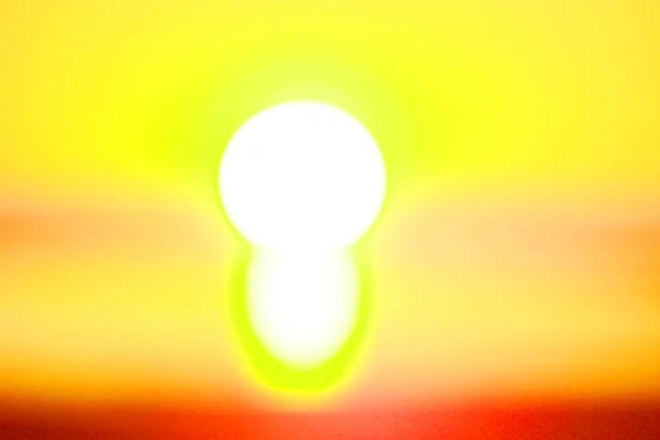 amazing_sunsets-yellow_reflection_over_red.jpg