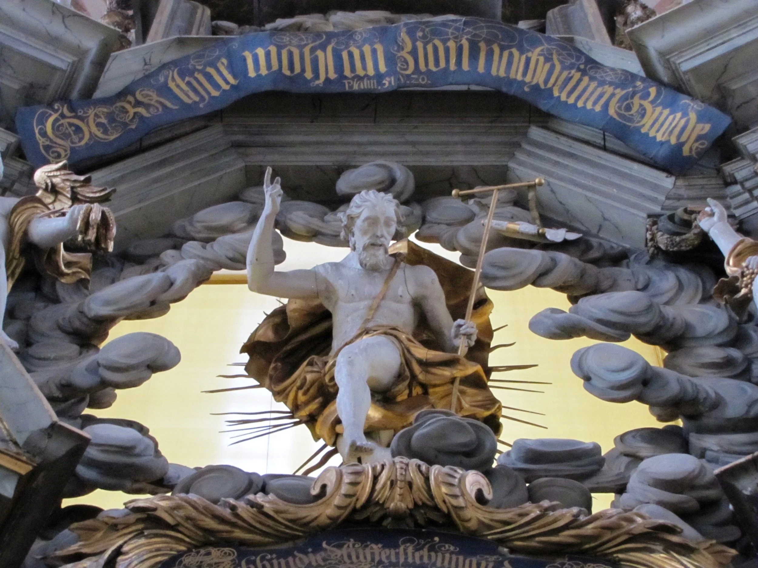 The banner over Christ’s head reads: “Lord, do good to Zion according to Your grace. Psalm 51:20” (English: Ps. 51:18)