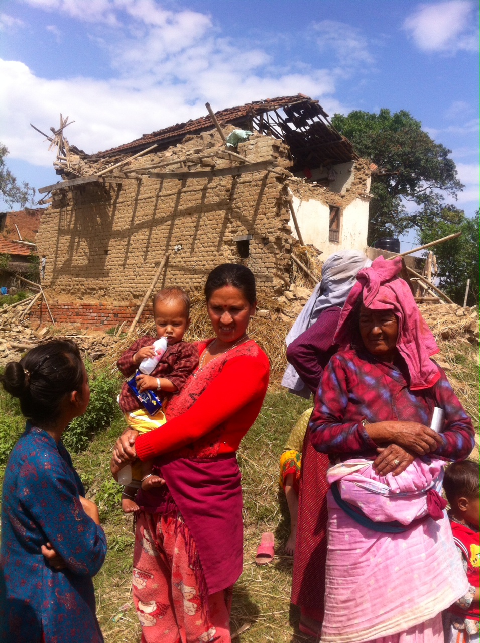 Woman and her newborn in front of their house - Bhaktapur.jpeg