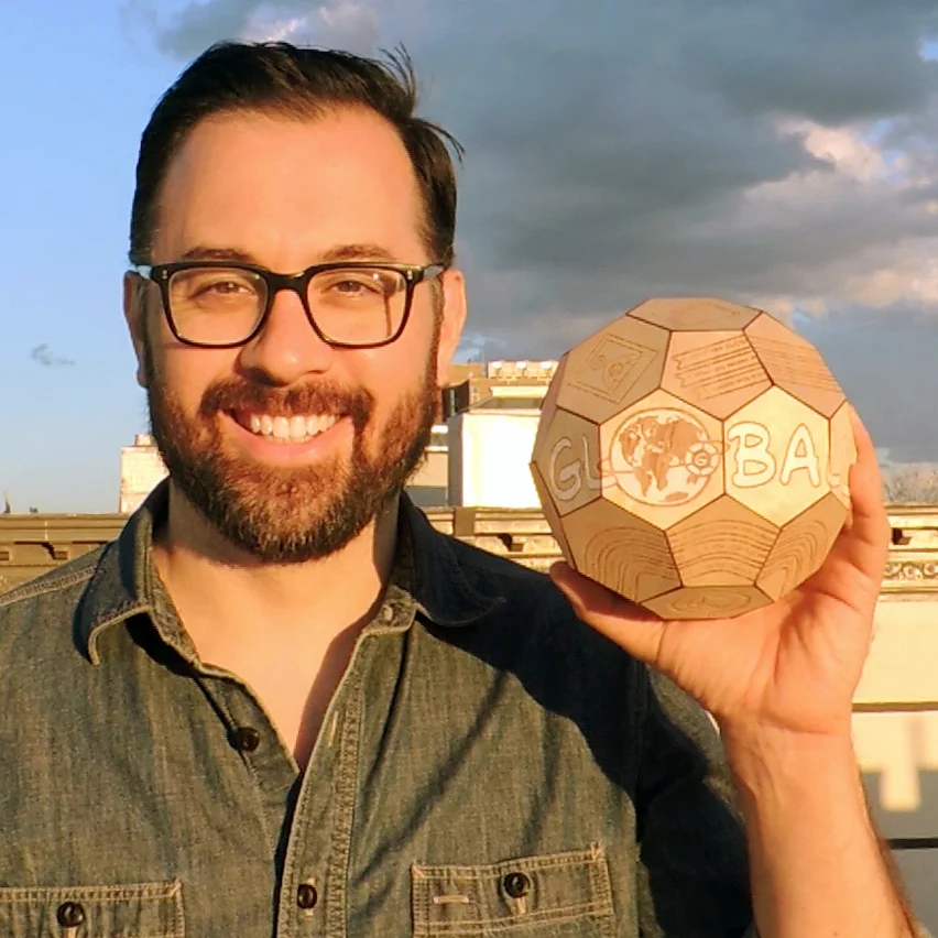 Oliver, the creator of GLOBALL holds a prototype maquette. 