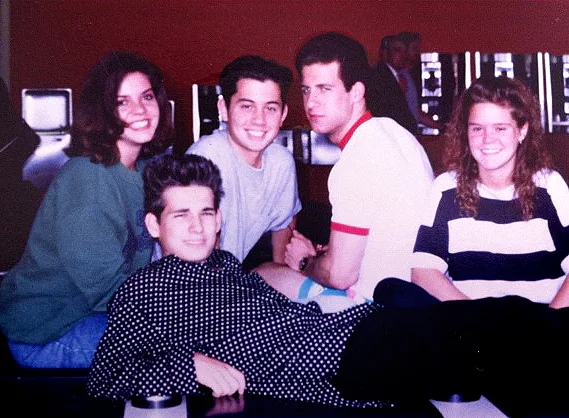 Oliver in the middle in a grey t-shirt and Adam to his left in white. Around 1989, rocking' the Breakfast Club vibes. 