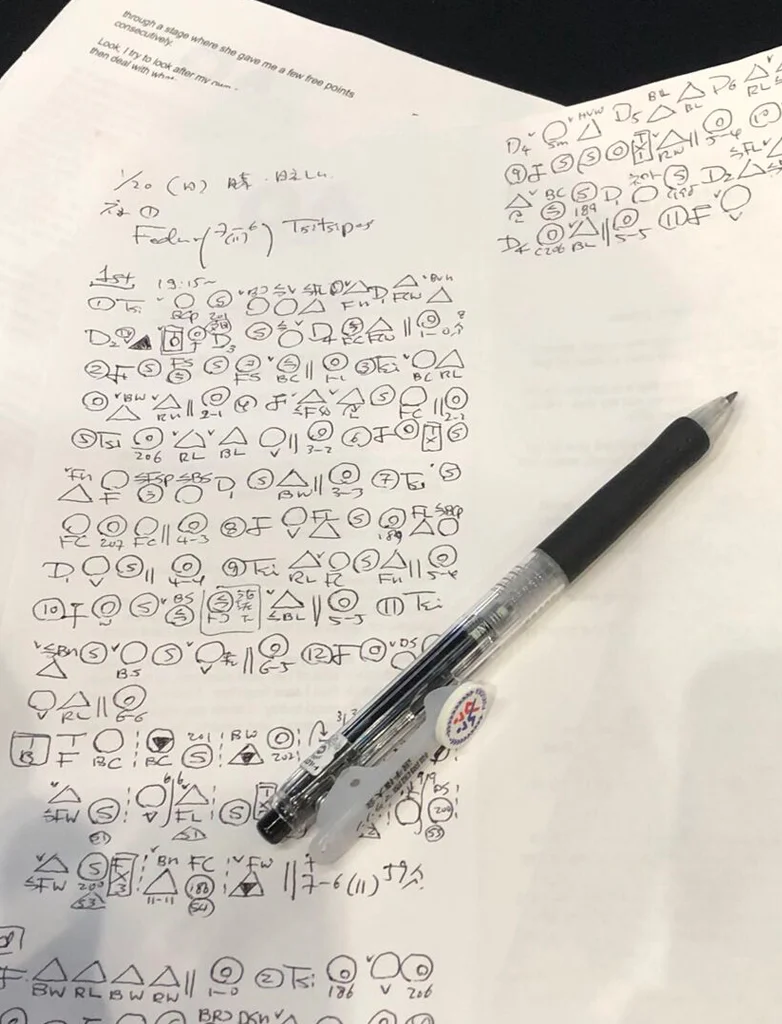 Tennis hieroglyphics.