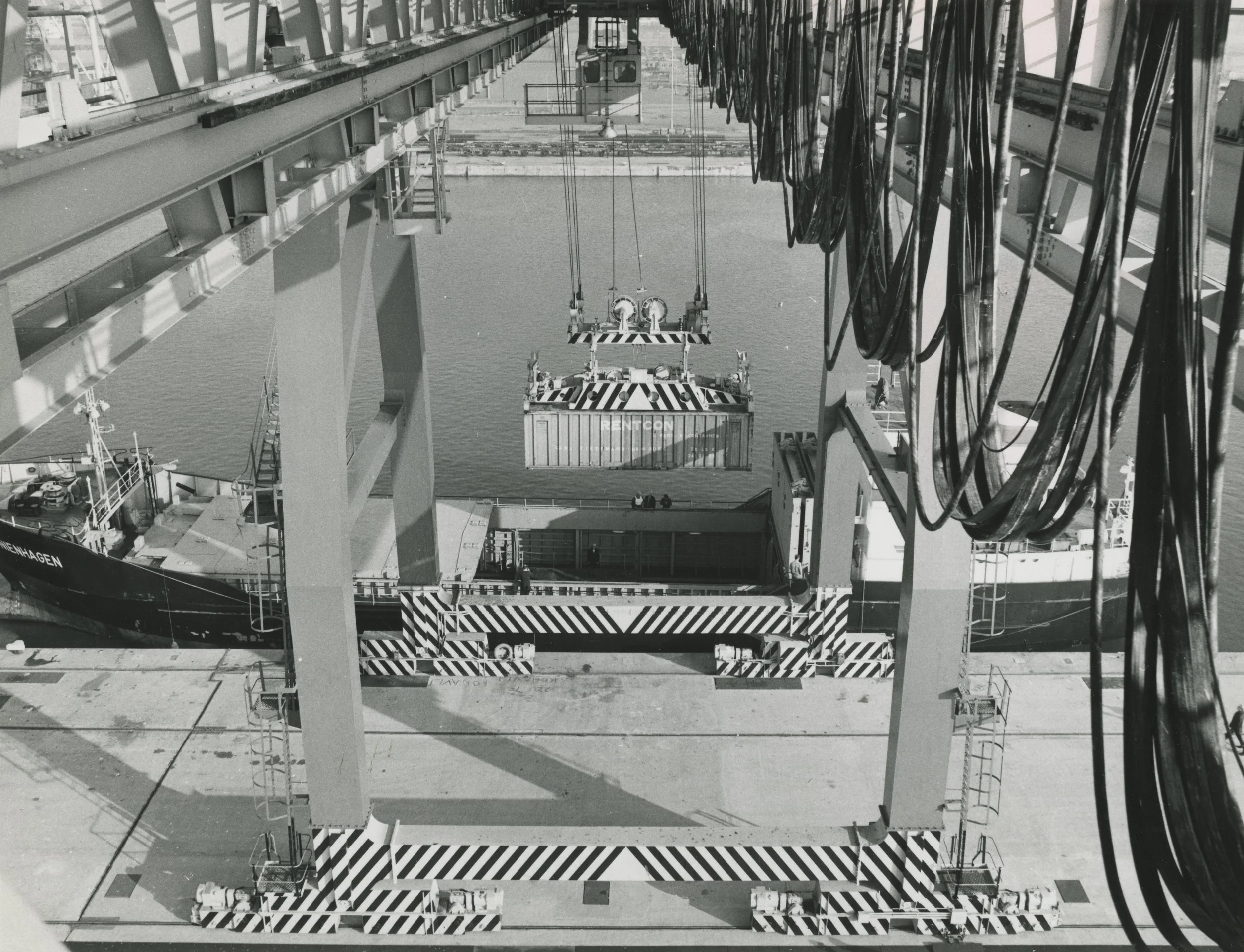 40 ton container being loaded on-board by a transport crane. Queen Elizabeth Dock, Hull. November, 1971. Photographer - Herbert Ballard Commissioned by ABP.
