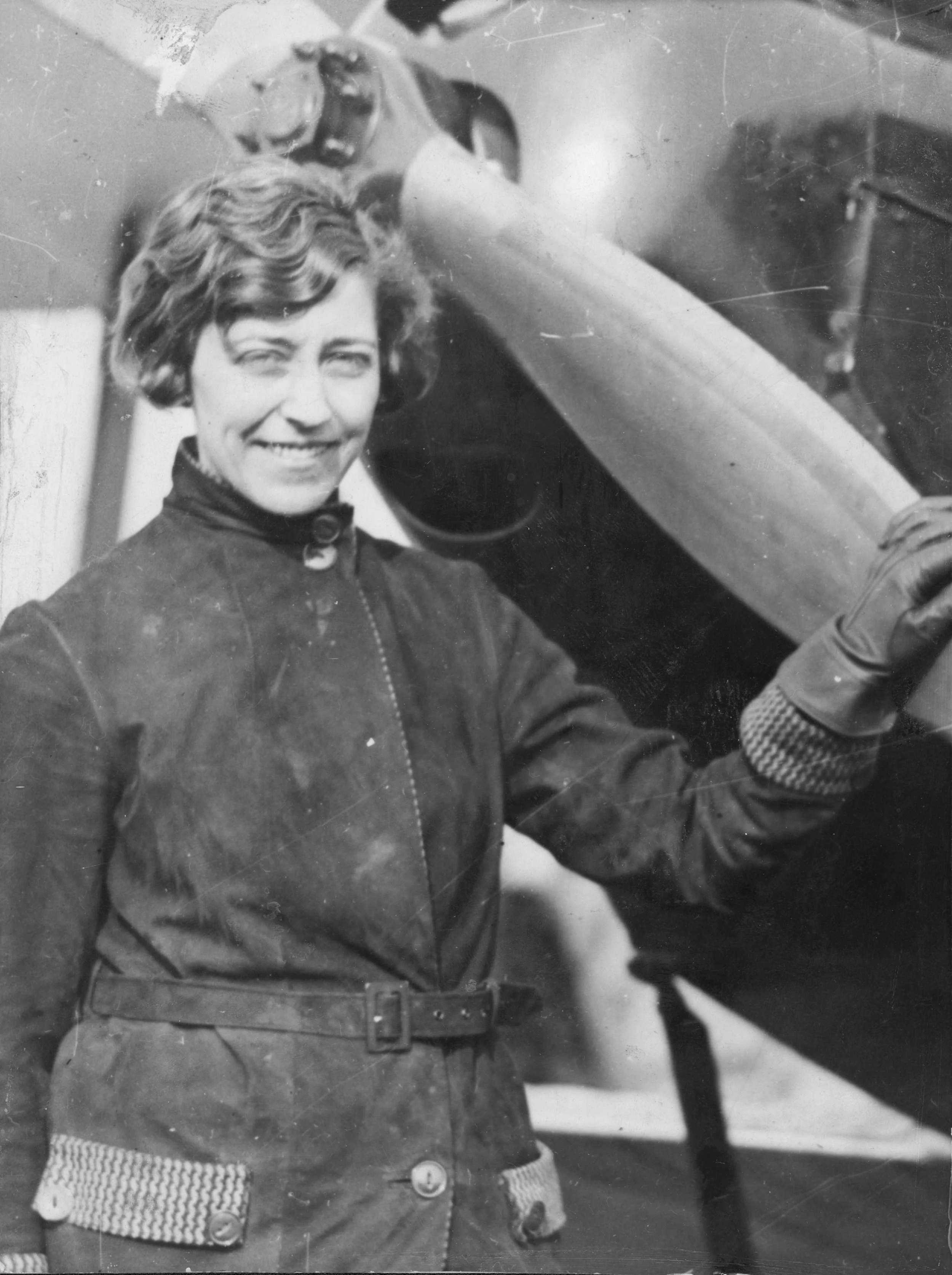 Amy Johnson standing beside 'Jason', 1930. Commissioned by Hull Daily Mail.