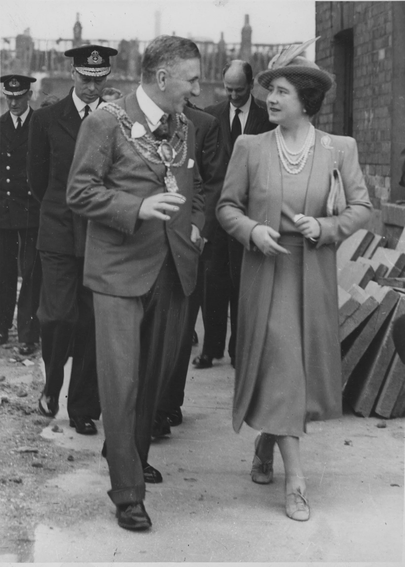 Queen Elizabeth (now Queen Mother) tours the 1941 blitx damage in Hull with Mr Tarran, 1940’s. Commissioned by Hull Daily Mail.