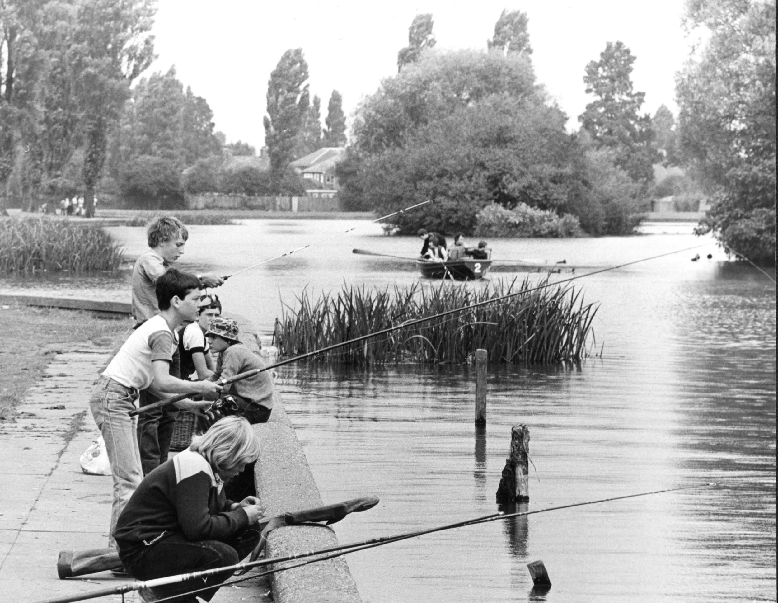 Fishing in pond at Pickering Park, 1980’s. Commissioned by Hull Daily Mail.