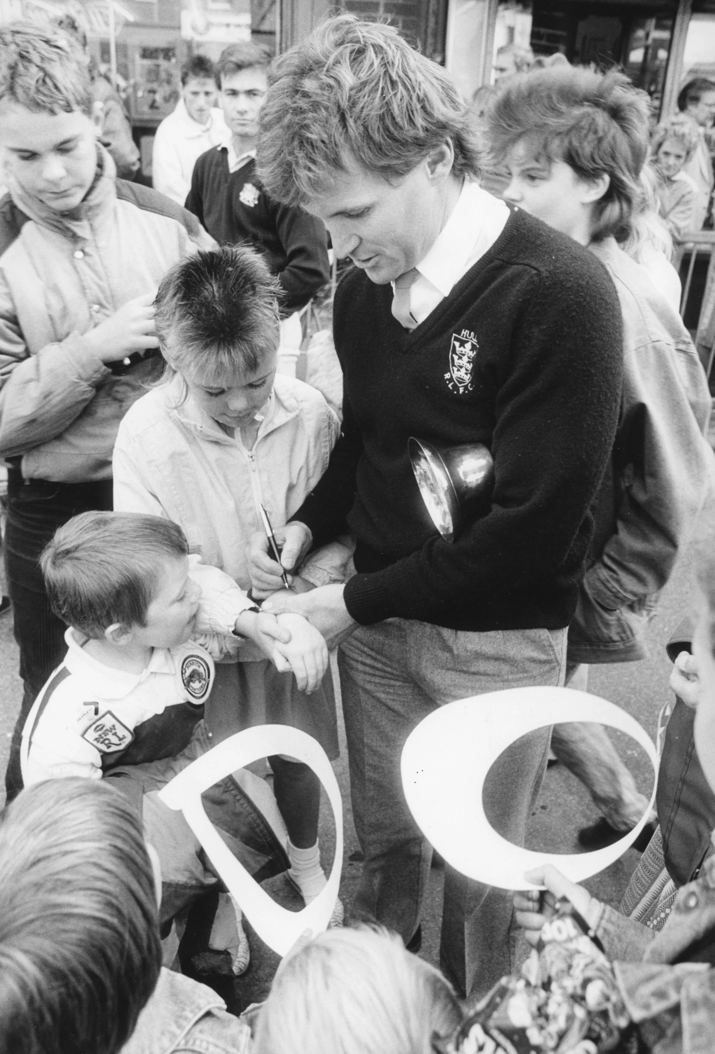Brian Smith, Hull FC's Australian coach, signing autographs at the Hessle Road Pram Race 21-09-1989. Commissioned by Hull Daily Mail.