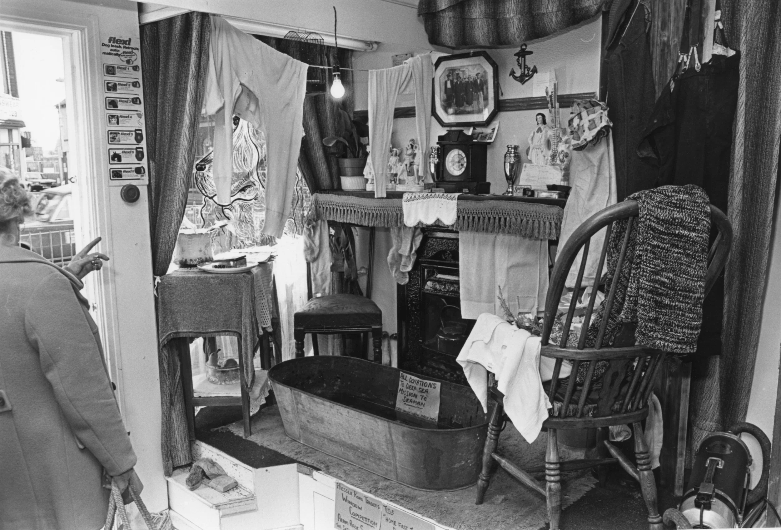 Hessle Road traders' window competition in aid of the Deep Sea Mission to Seamen: 'Angels Pet Supplies' with display like an old-fashioned house Sept 1987. Commissioned by Hull Daily Mail.