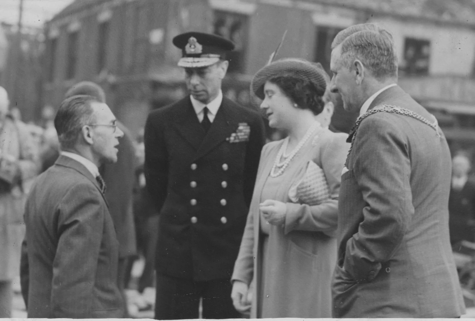 The King and Queen chat to Mr D. E. Crickmay (left) and the sheriff of Hull, Mr R.G. Tarran, 1940’s. Commissioned by Hull Daily Mail.