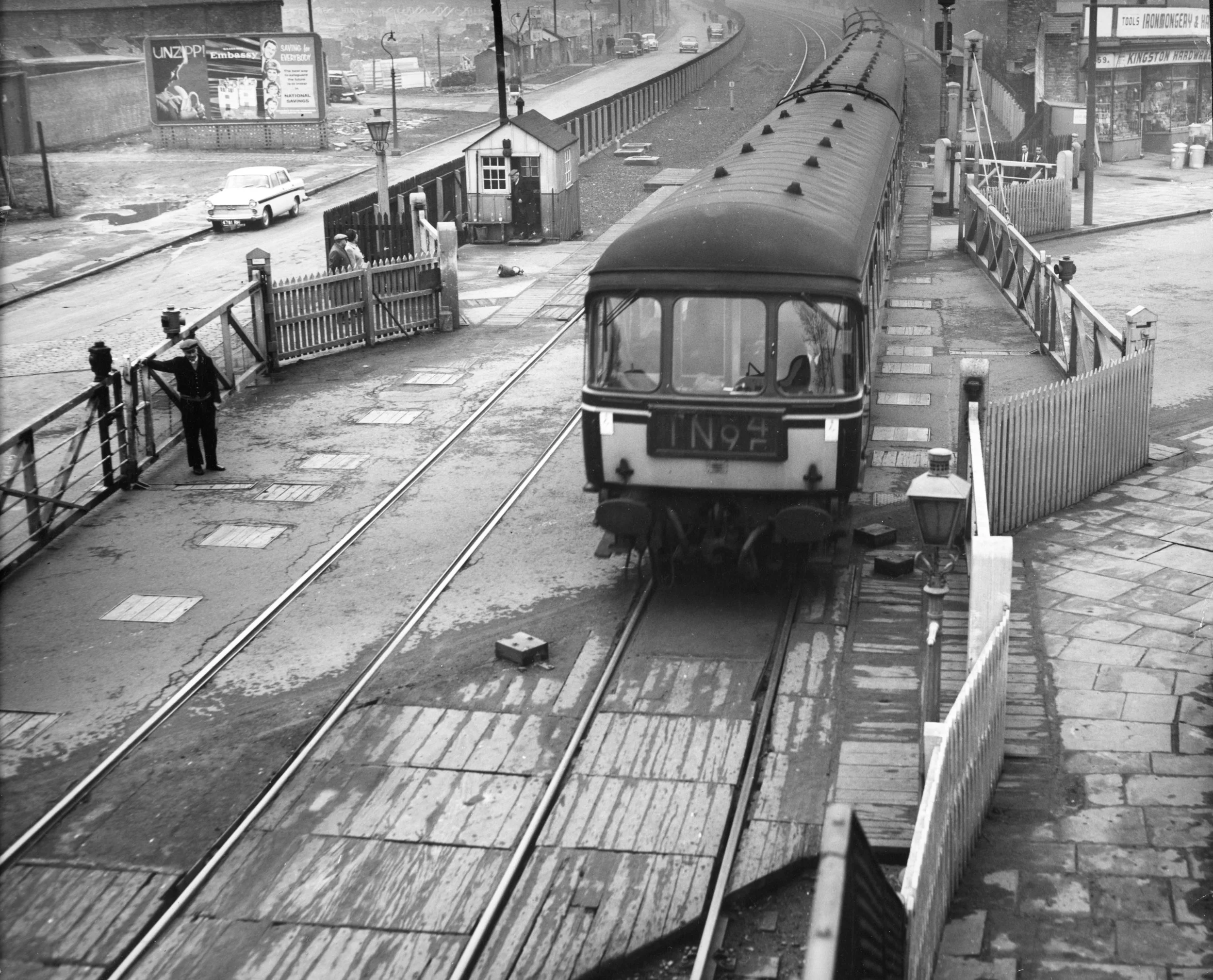 Train at Anlaby Road level crossing before construction of flyover March 1963. Commissioned by Hull Daily Mail.