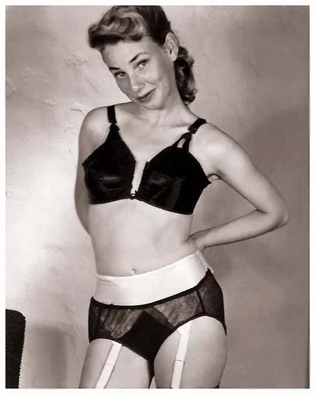 coy-poser-1950s-v0-qdzc3lq35dlg1.jpg.webp