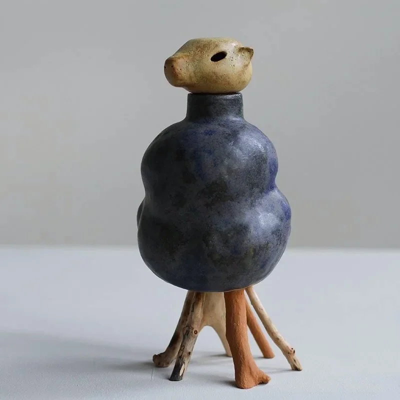 C E R A M I C S // *SOLD* - Marmot Canopic Jar.
Glazed stoneware and found wood.
2024.