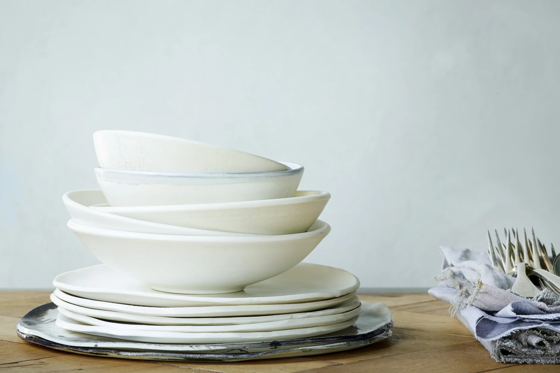 Prop styling : stack of hand made plates and bowls