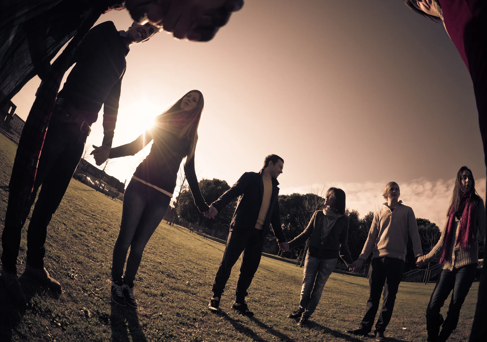 Group in circle holding hands .jpg