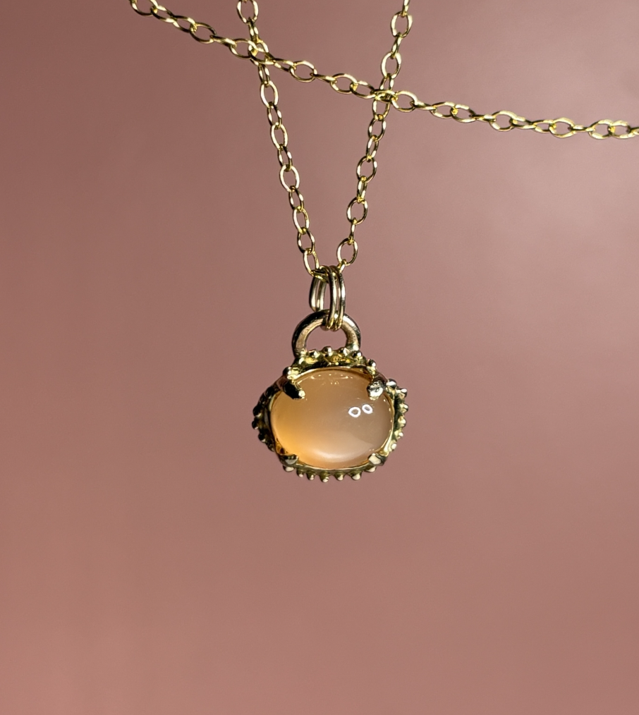 Studio Avdel Sasha Dubodel Quatrefoil Peach Moonstone Gold Pendant 1.png