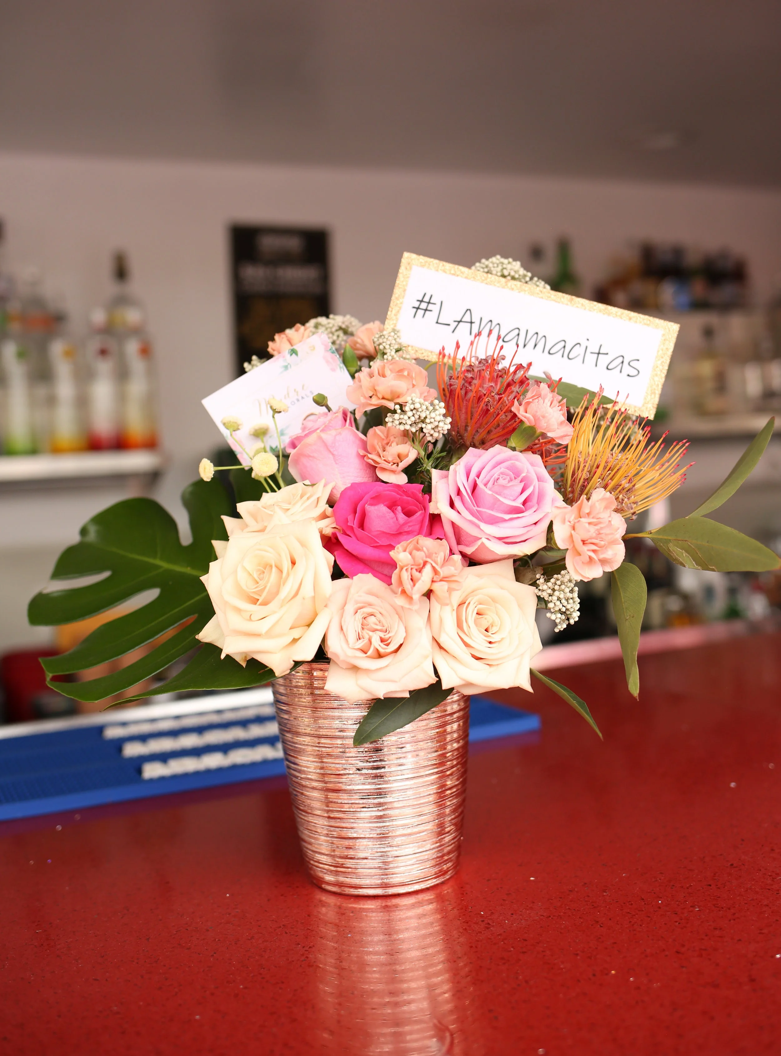 The bar got a feminine touch and make-over by Madre Florals