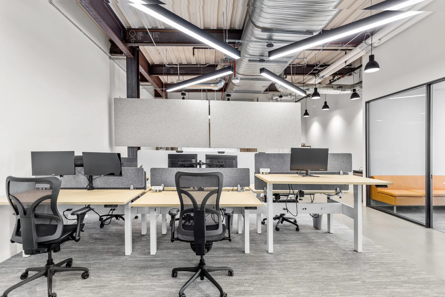 Ergonomic desk and chair setup by Source COI