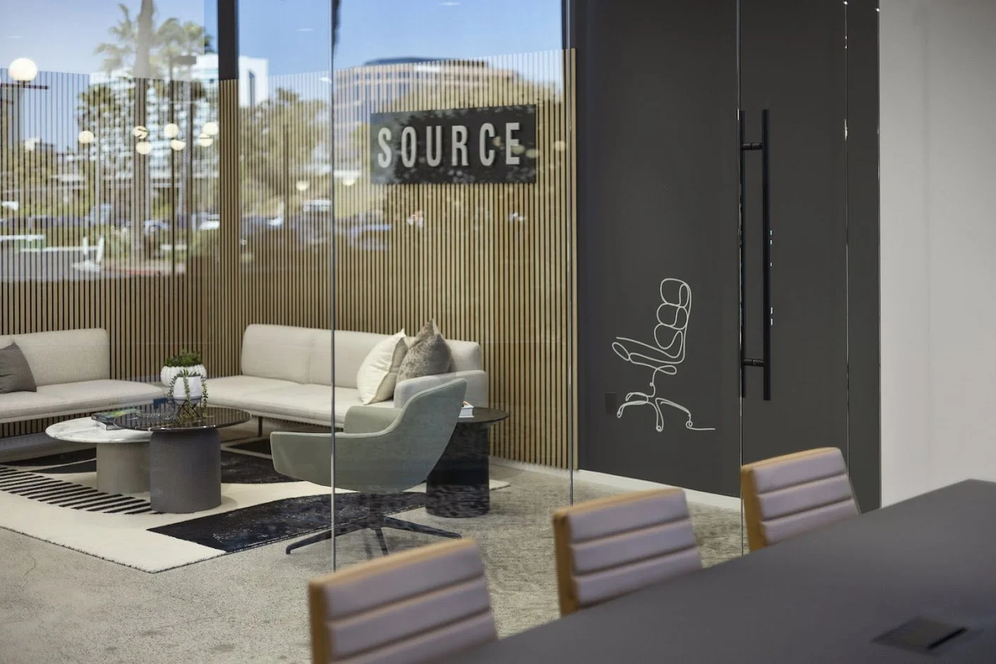 Geometric drawing of an outline square with sections divided by vertical, horizontal, and diagonal lines.