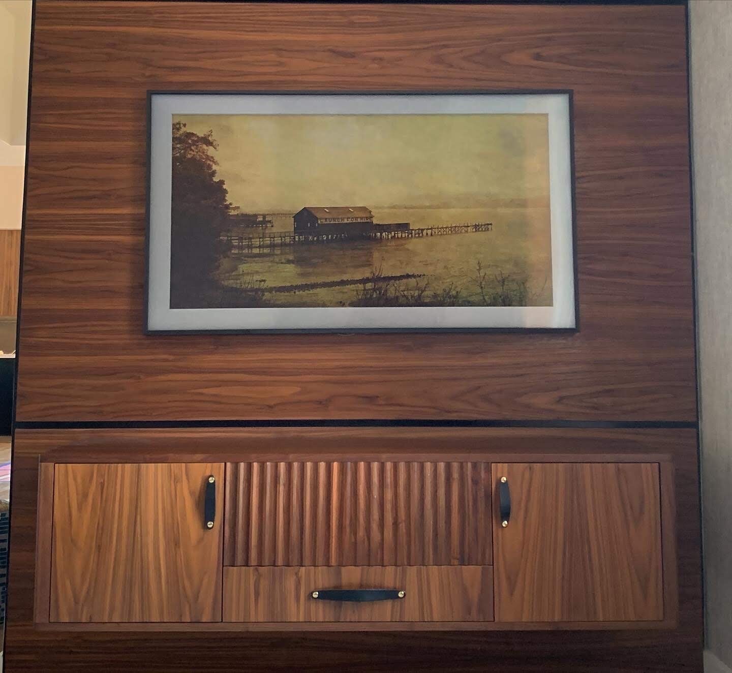 Floating Entertainment Console with Wall Paneling