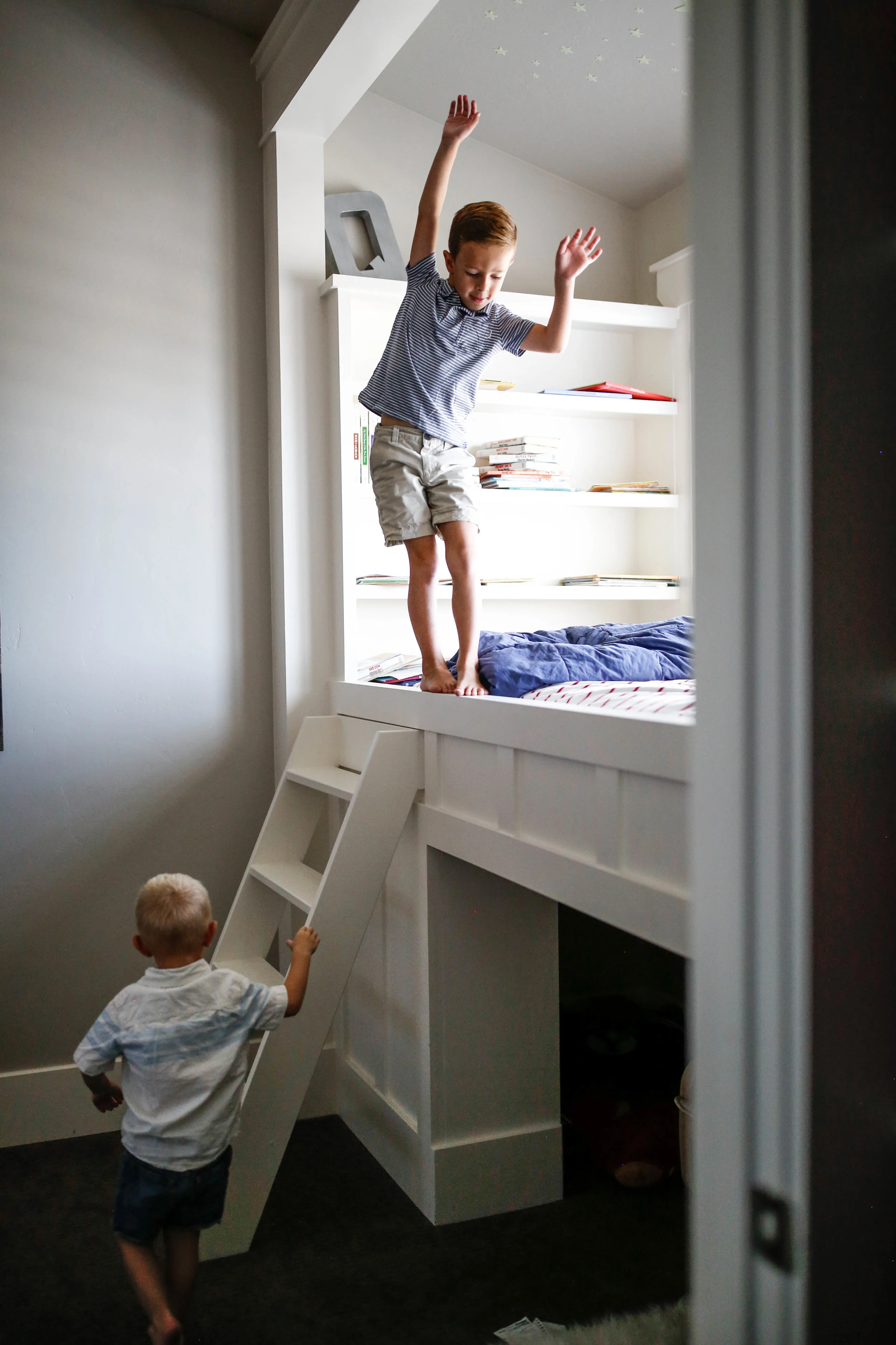 Monkey see, monkey do. Love that little brother follows big brother's every move! 