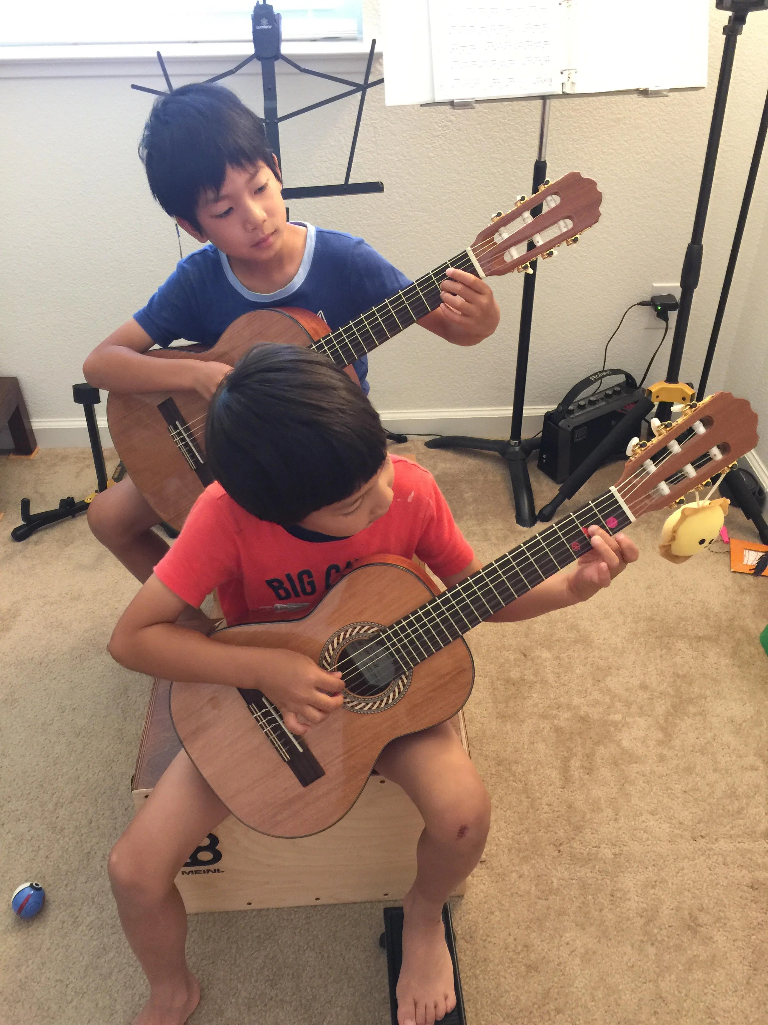Sean and Noah practicing hard at home