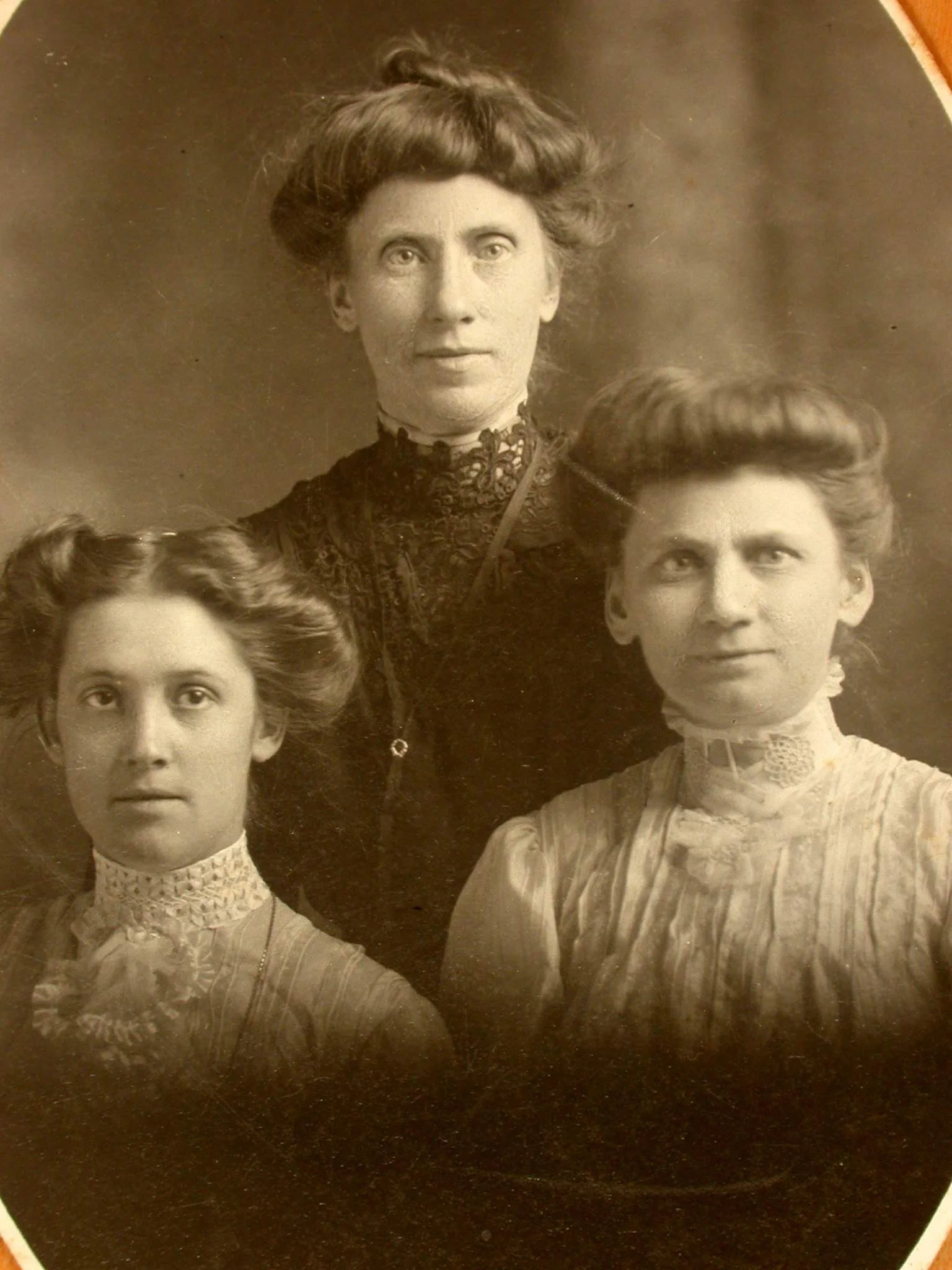 1887. Left to right: Isobel (Bel), Margaret, and Mary Spencer. This picture was taken in St. Catherines by an unknown photographer.