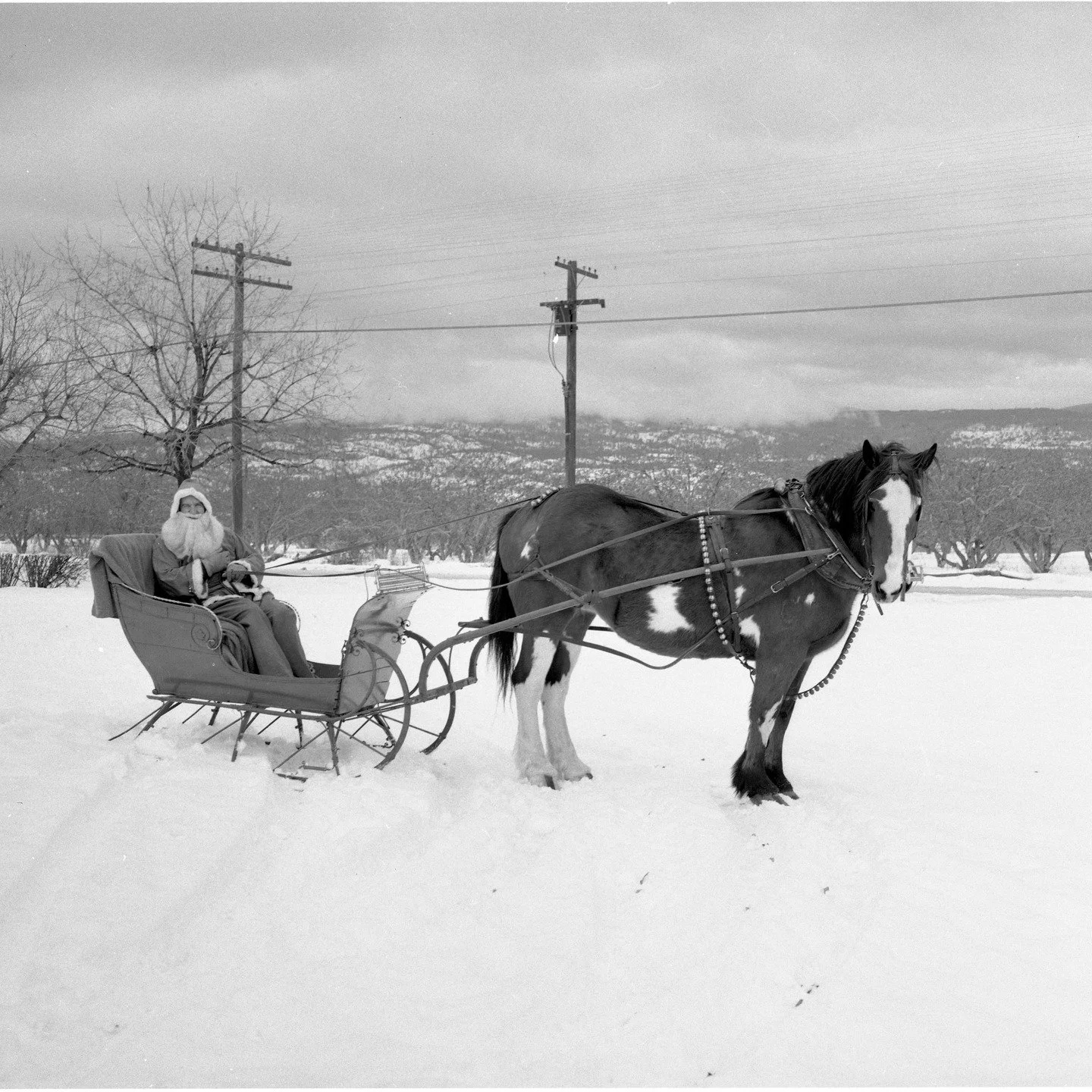 🎼He's making a list, he's checking it twice...🎼
Did you know that today is Santa's List Day, the day on which Santa makes his famous Naughty or Nice lists? 

The Santa in today's Throwback Thursday photo looks like he has those lists nailed down an