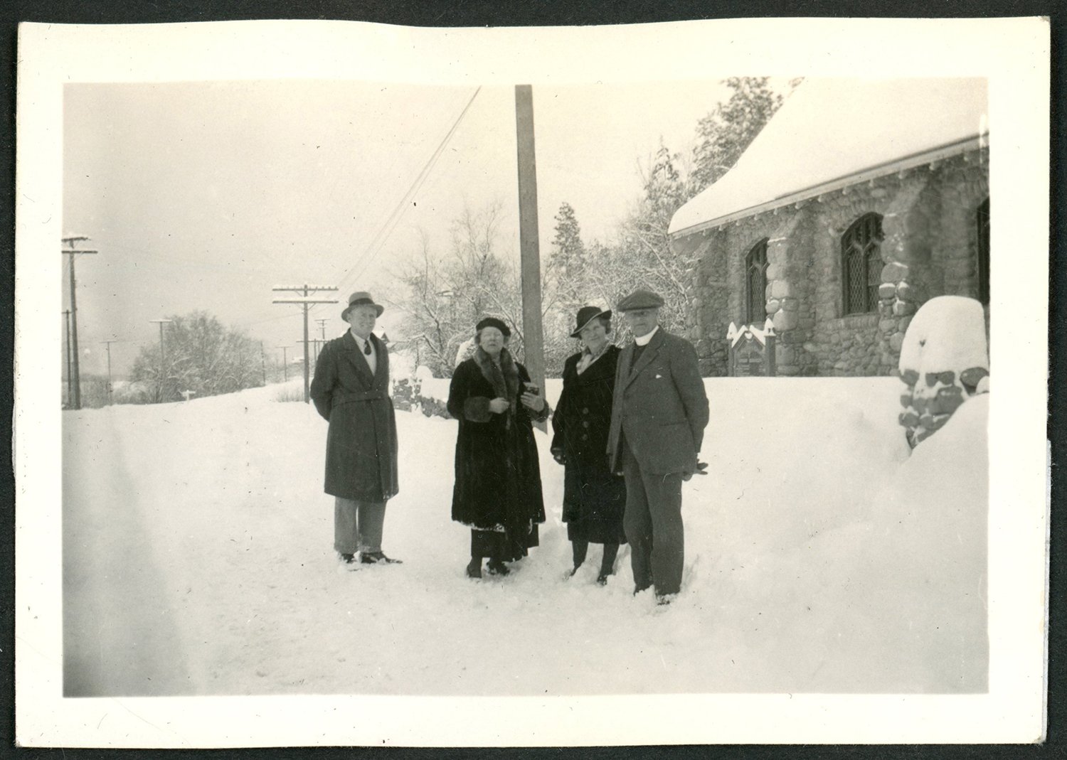 With the bizarrely mild and snowless winter we're having, we thought we'd share a photo of a more typical Summerland January for this week's Throwback Thursday!

This photo from c.1930 shows Rev H. A. Solly and his wife Dorothy Solly standing in deep