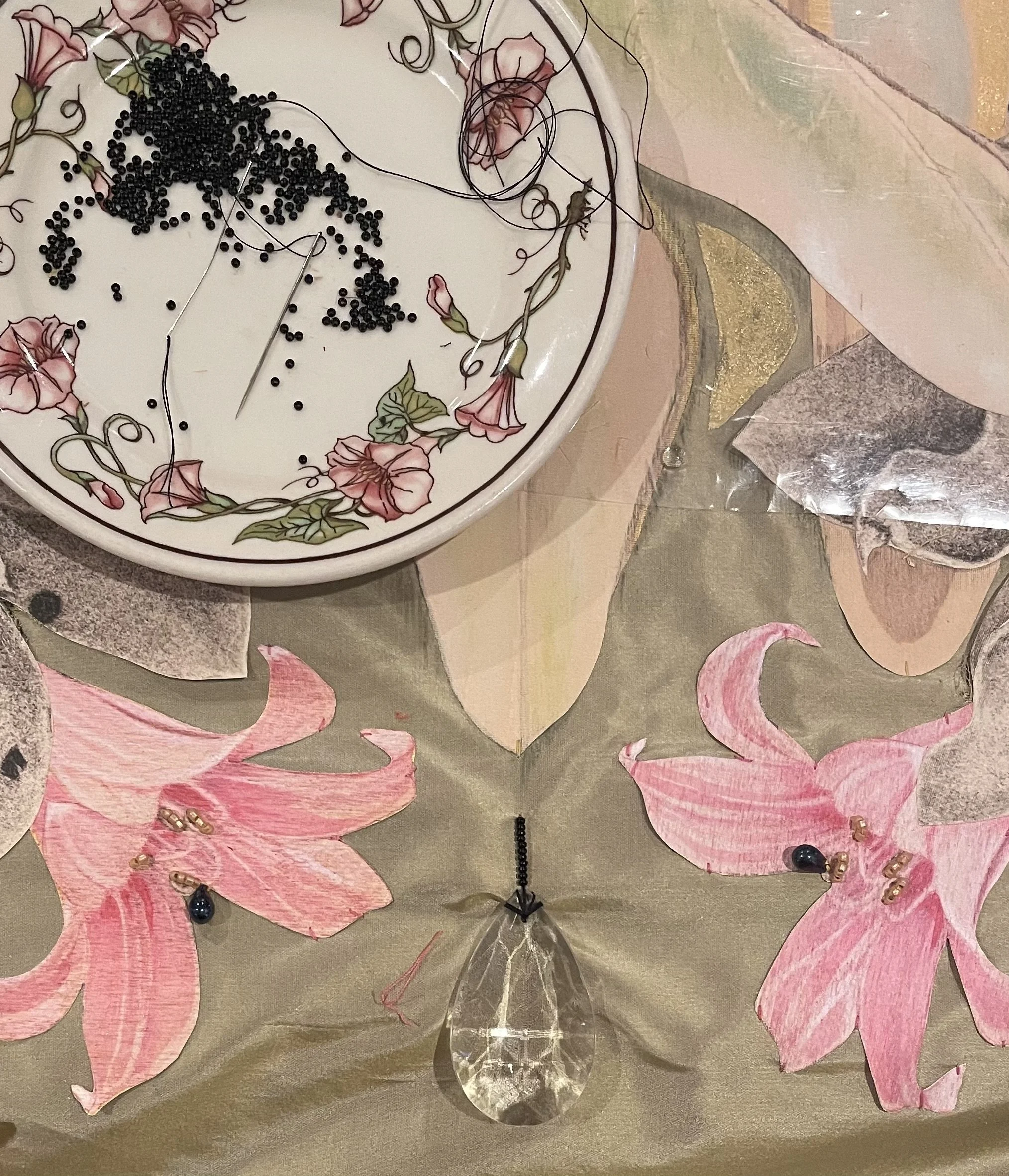 Detail of "The Return" showing beading work in progress.