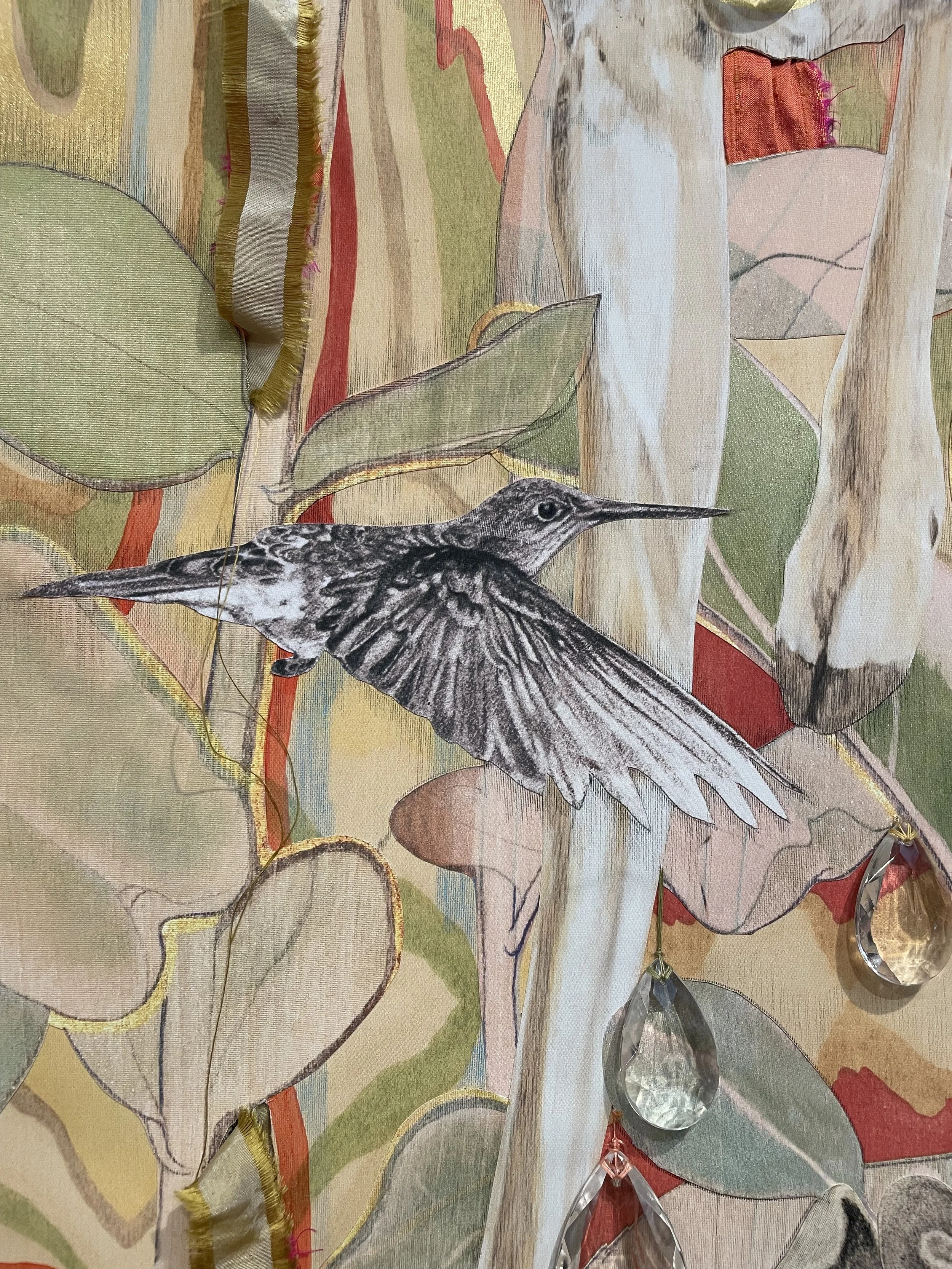 Close-up detail of hummingbird, accented with crystal beads.