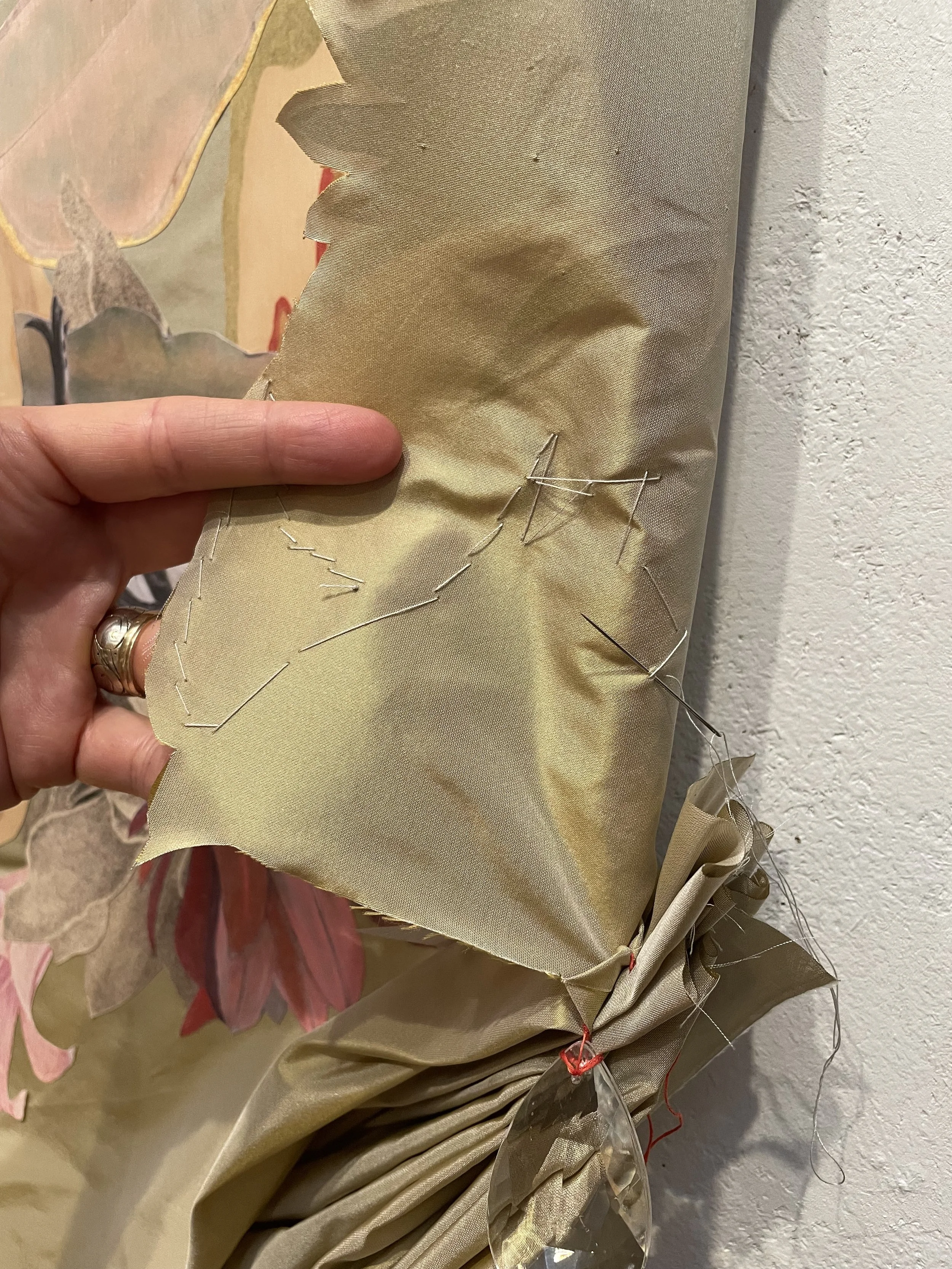 Detail from "The Return" showing stitched and gathered edges of silk fabric.
